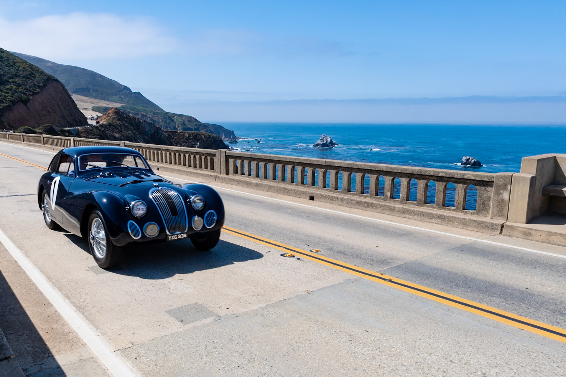 In 1946, Talbot Lago introduced its new T26 Record chassis, a direct development of the prewar T150. The powerful Grand Sport chassis, with an alloy-headed 4.5-liter straight-6 engine, was added to the lineup two years later. A total of 36 Grand Sport chassis were constructed, and several were built as pure racing cars. The T26C claimed Talbot Lago’s biggest victory, winning the 24 Hours of Le Mans in 1950. This particular T26 GS (chassis 110105), with an extensive racing history that includes five starts at Le Mans from 1949 to 1953, is perhaps the most famous of all. This car also participated in numerous races and rallies in the hands of its first owner, Andre Chambas. He bought the chassis and took it to the little-known coachbuilder Contamin, who crafted this lightweight coupé body. The car was re-bodied as an open barchetta for much of its racing career, but when that concluded Chambas put the original coupé back in place.
