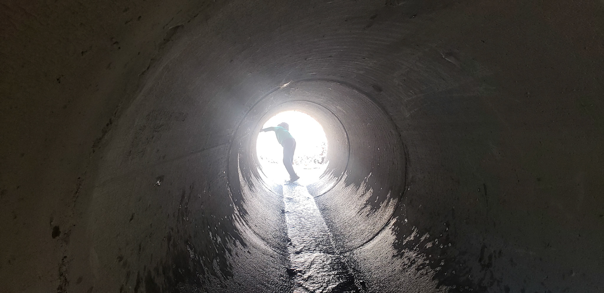 Stream culvert the kids like to run through 