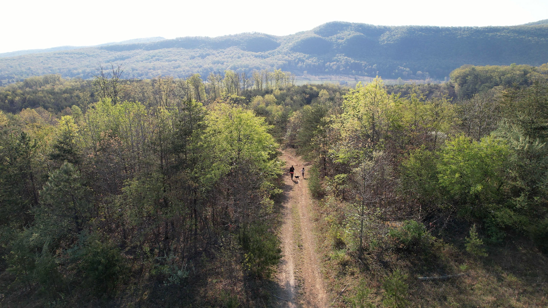 Walking down the mountain toward the river
