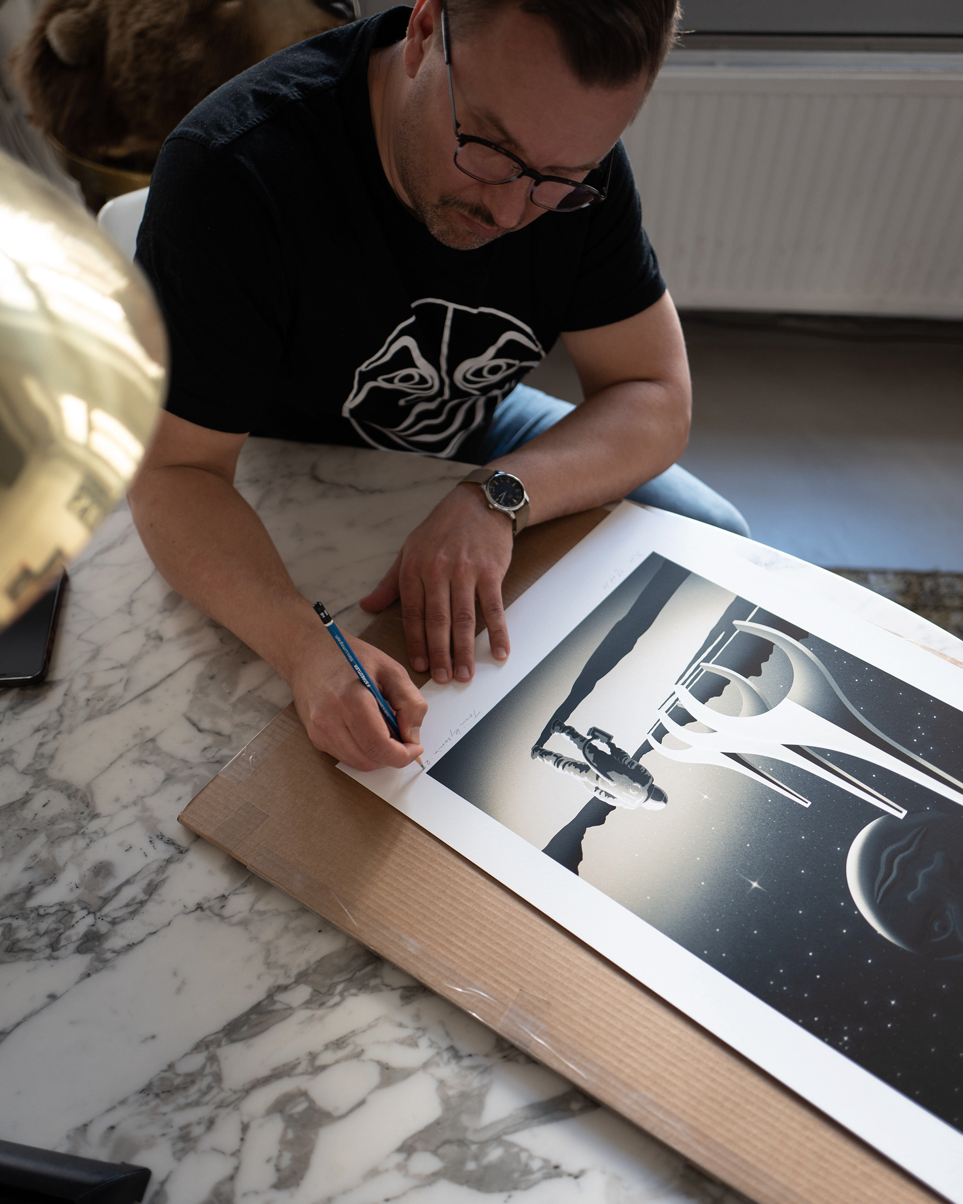 Museum quality giclee prints were numbered and signed before sending them out to the customers.