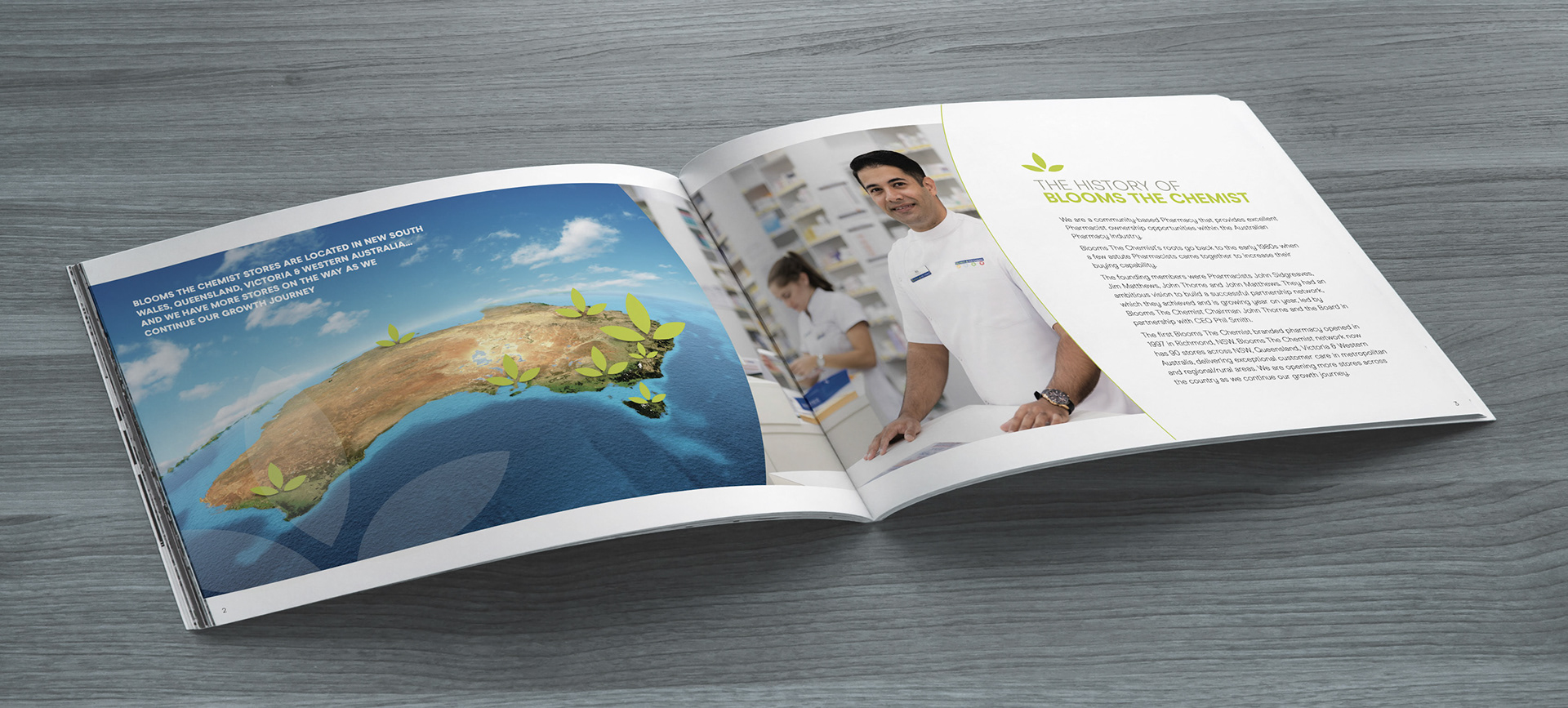 Photo blank. Open square format brochure on a wooden table