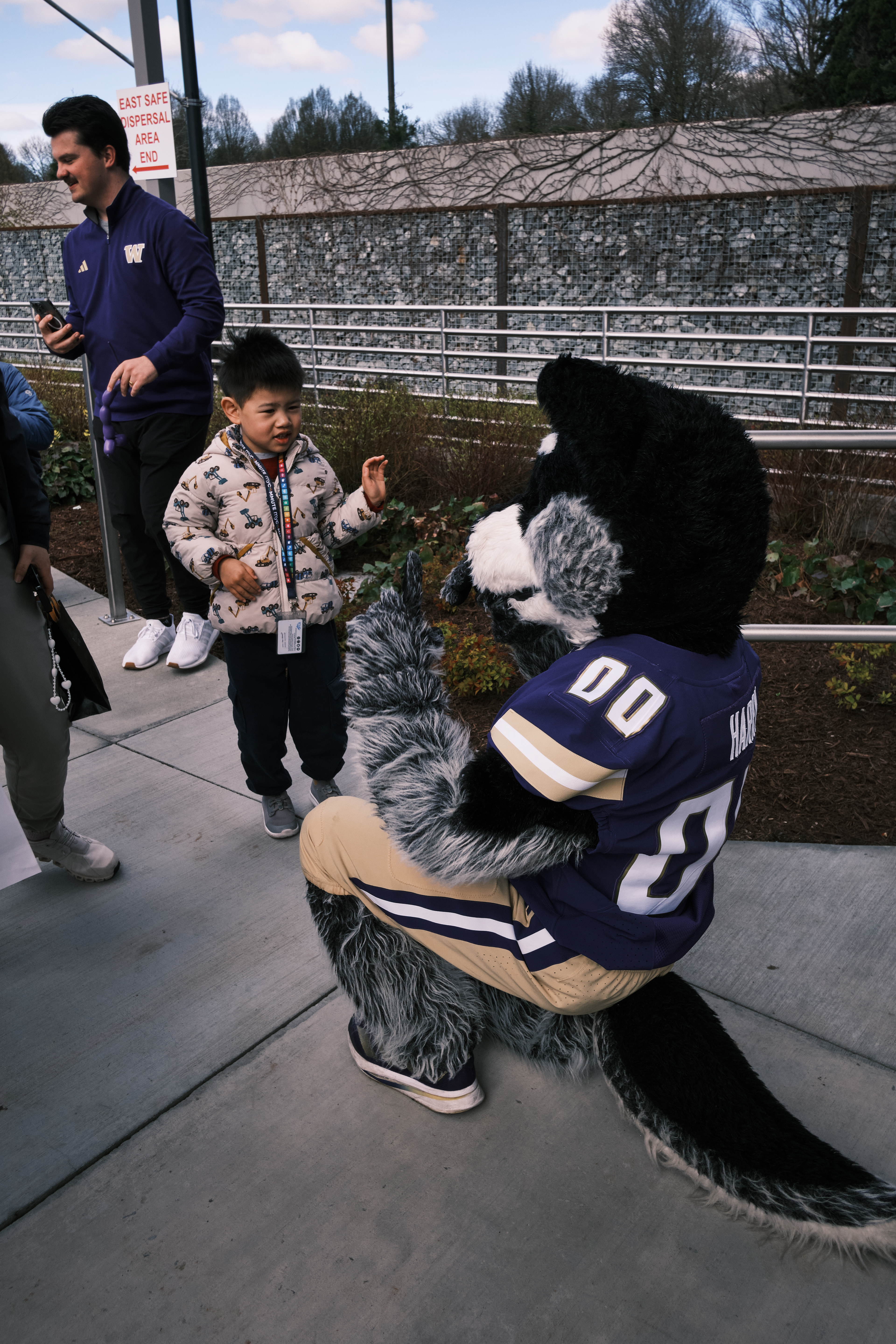 Husky mascott boarding at the Mercer Station