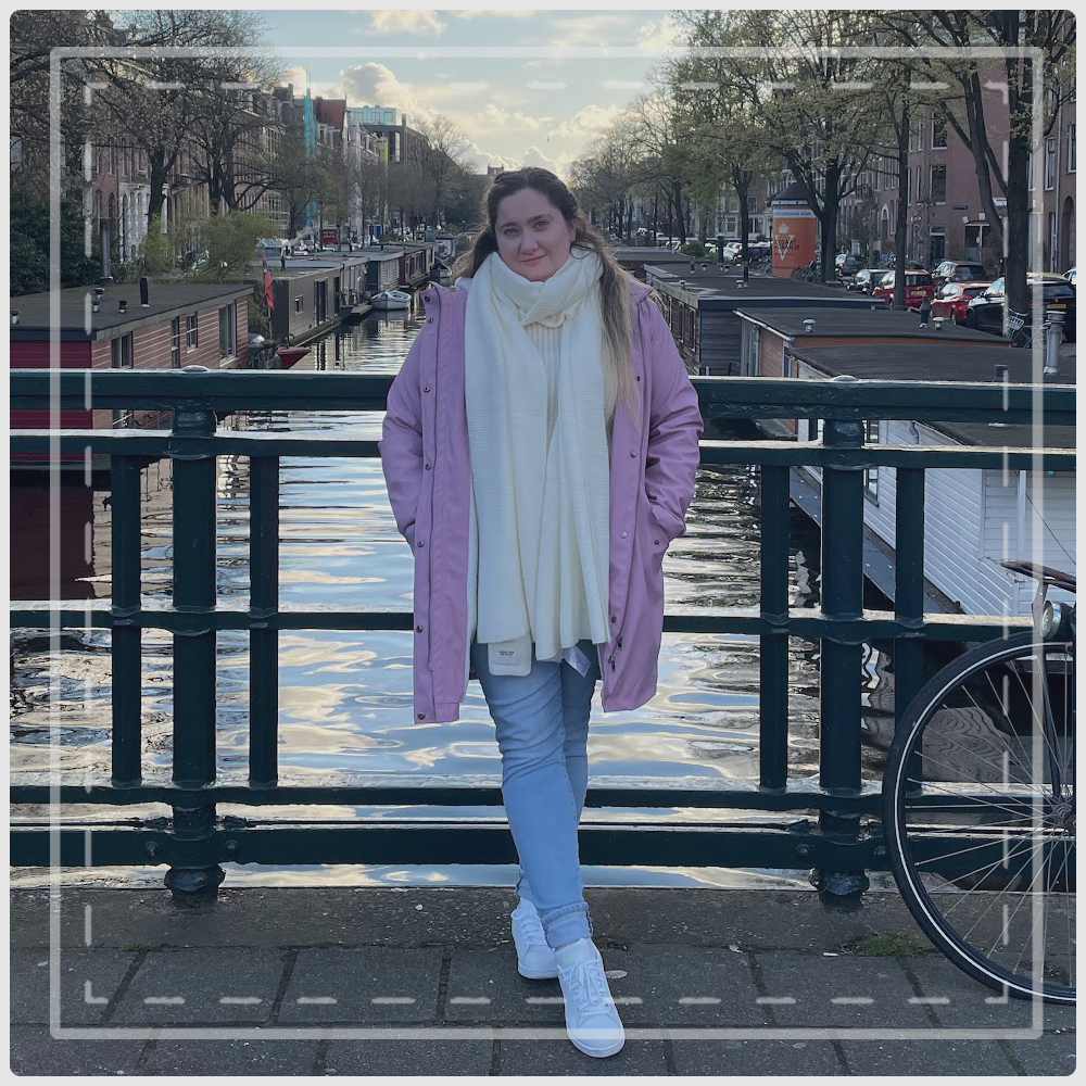 Paz posing in one of the many beautiful canal bridges in Amsterdam..