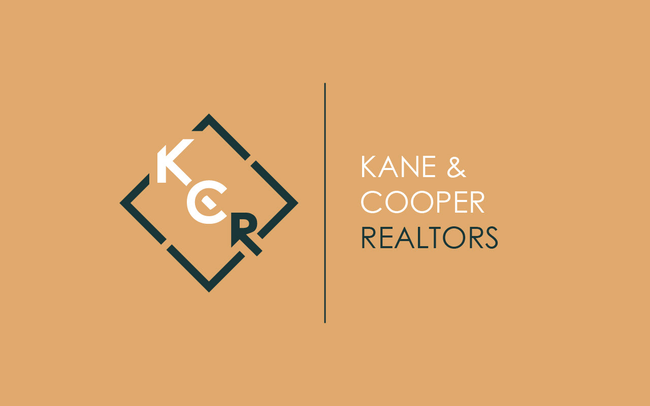 kane & cooper realtors logo (mustard background)
