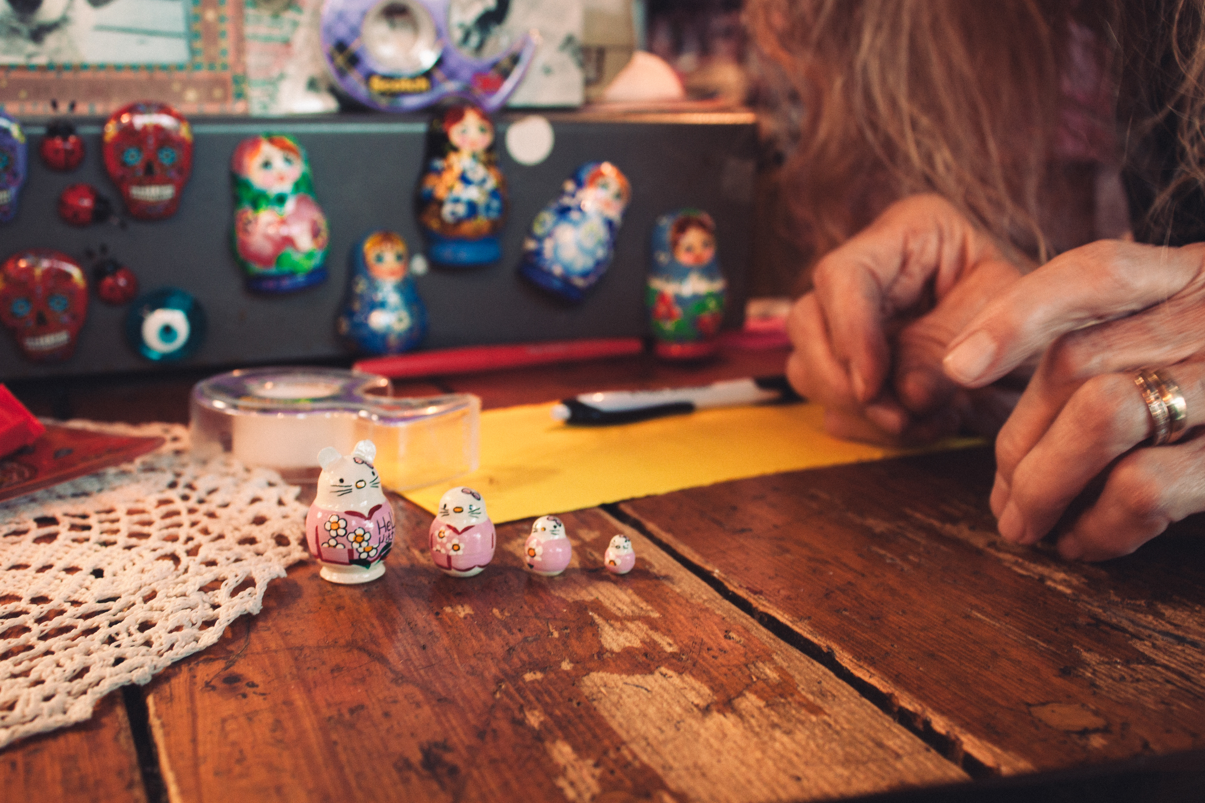 Halina Danchenko (store owner) opening the tiniest of matryoshkas