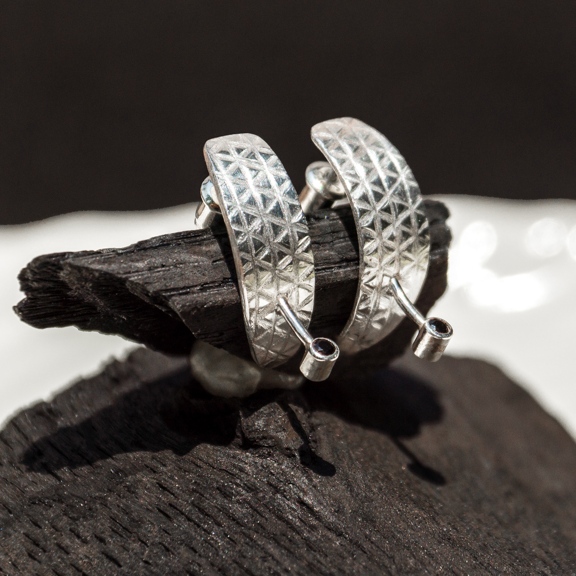 black spinel geo half-huggies (sold)