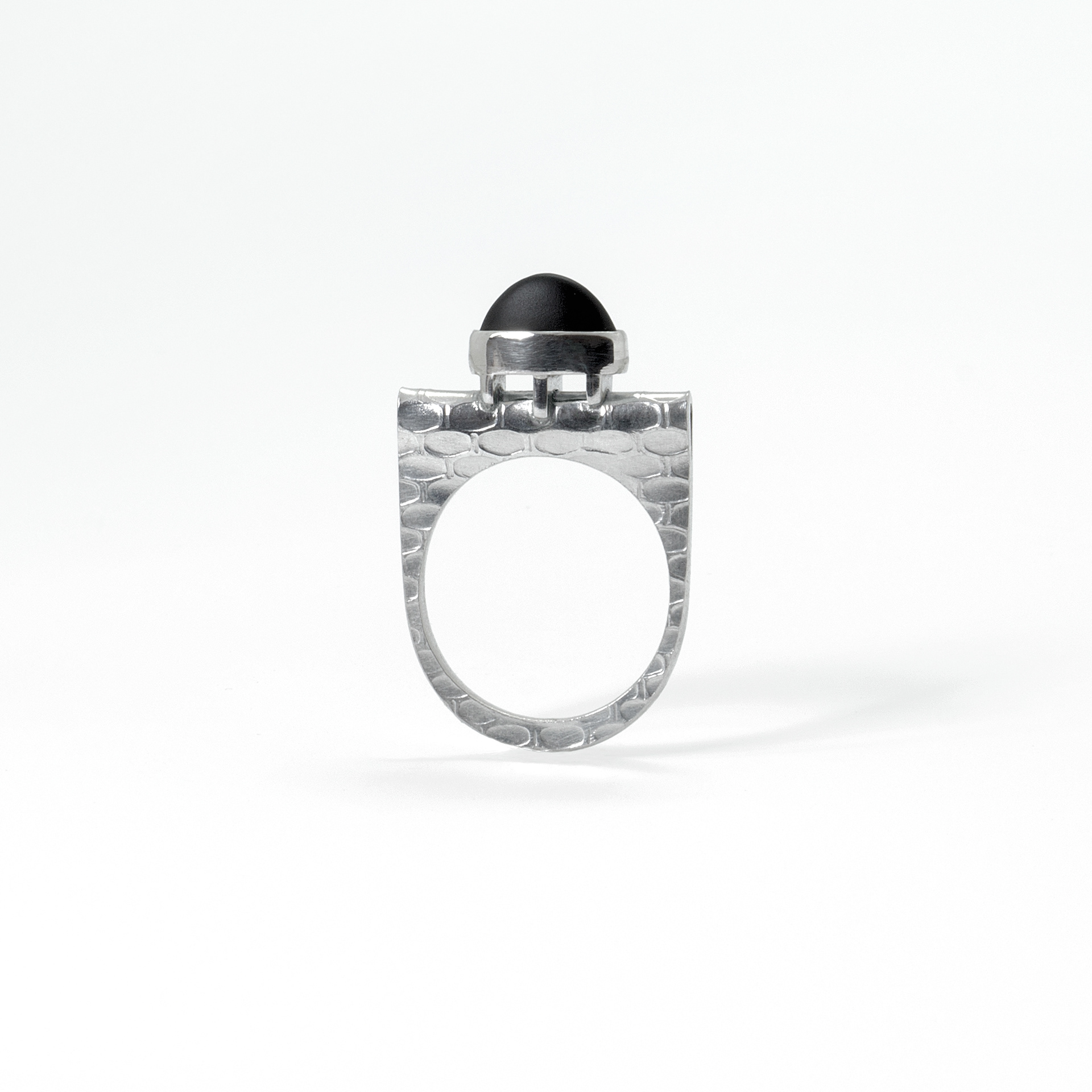 handmade embossed sterling silver size 7.5 ring with elevated high-dome matte black onyx bezel set cabochon