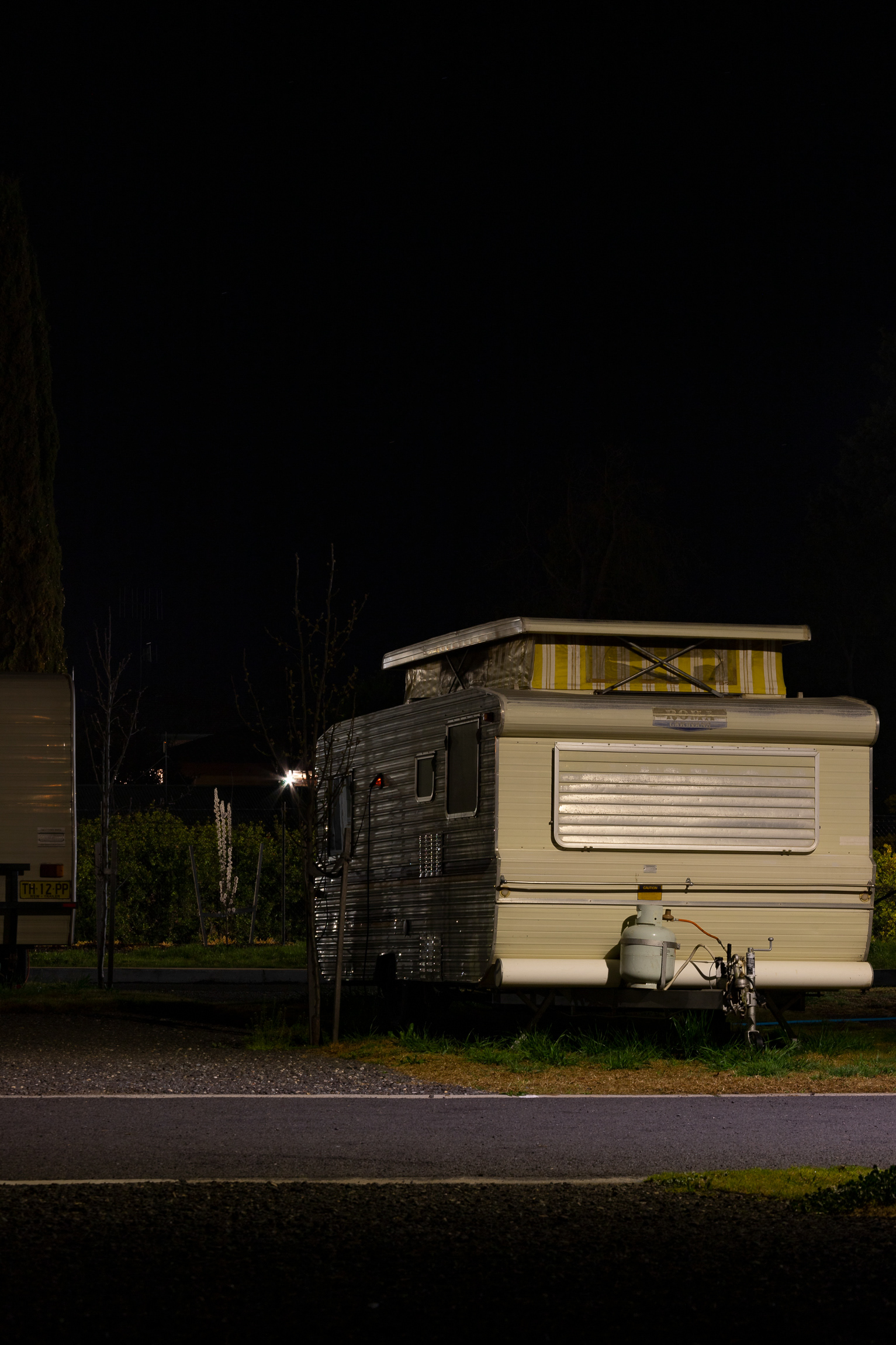 night photo of a caravan park