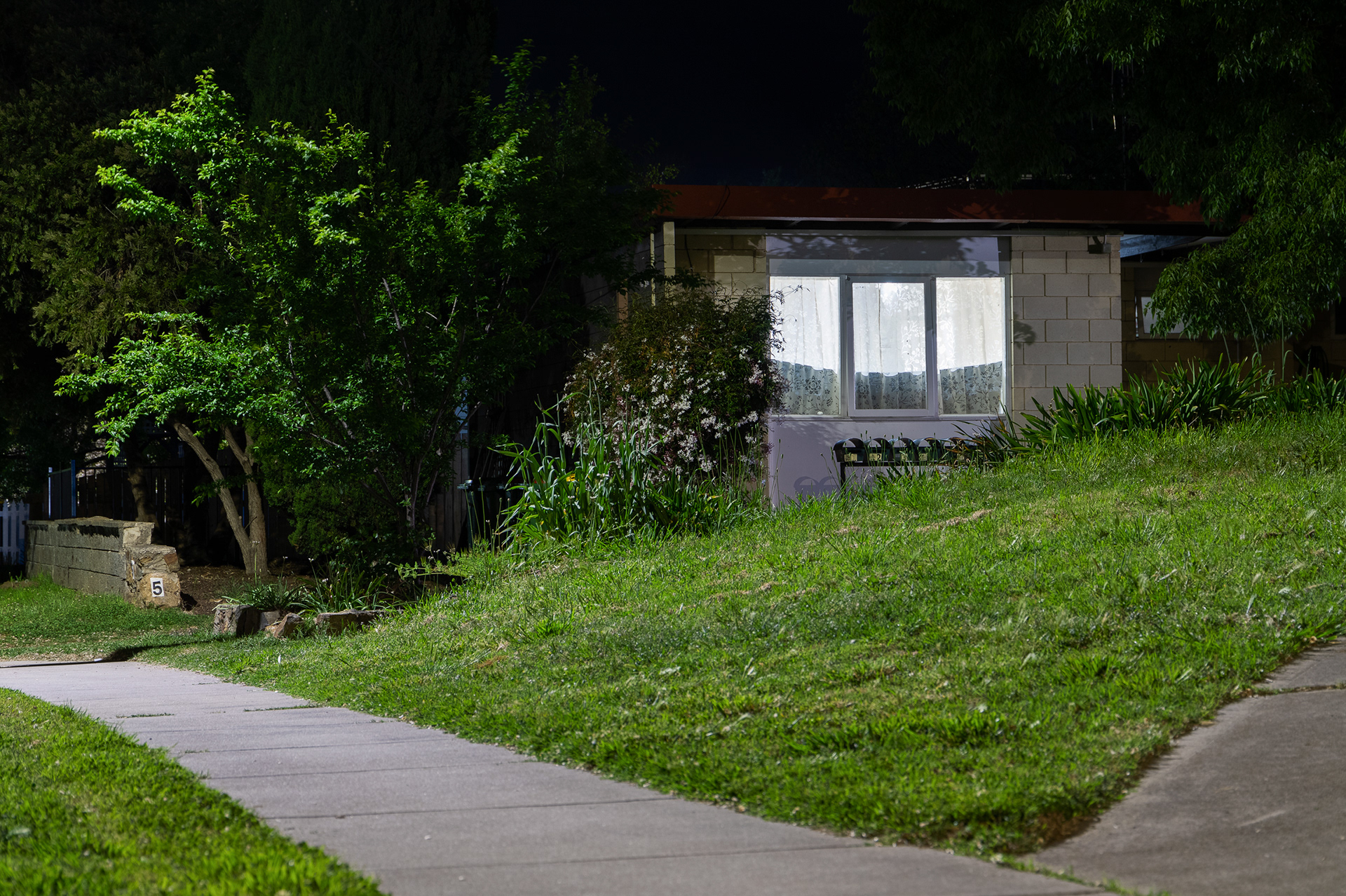 night photgraph of a tiny unit with the light on