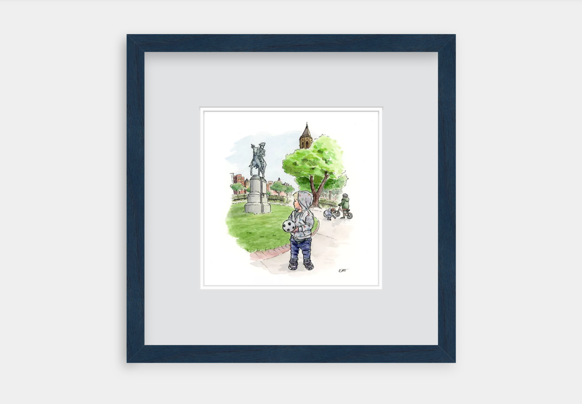 Child playing with soccer ball in Stanton Park with the statue and nearby church behind
