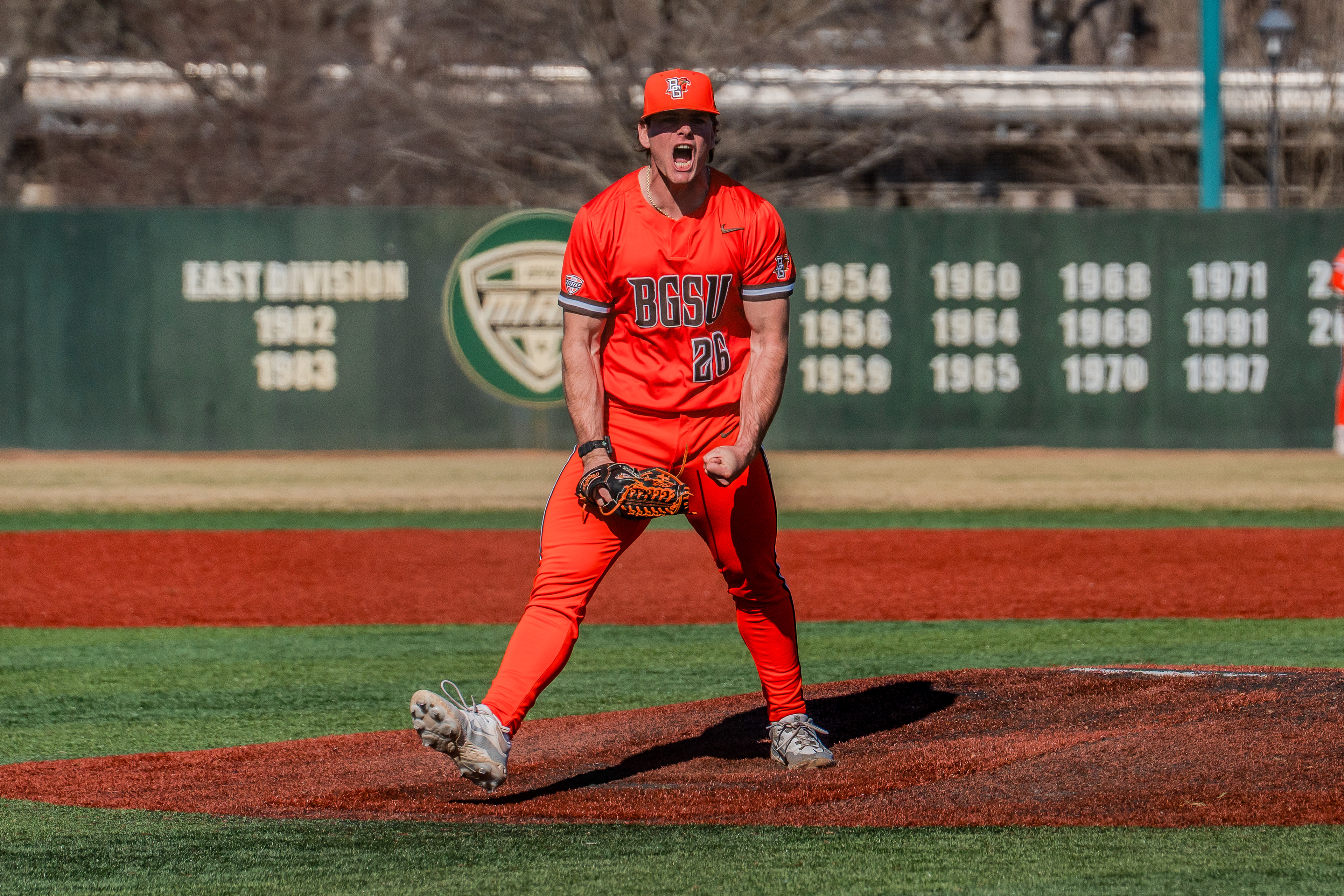 ATHENS, OH - Falcons redshirt-freshman Titus Lotz (26) comes off the mound screaming after recording a Saturday save against the Ohio Bobcats at Bob Wren Stadium in Athens, Ohio. 