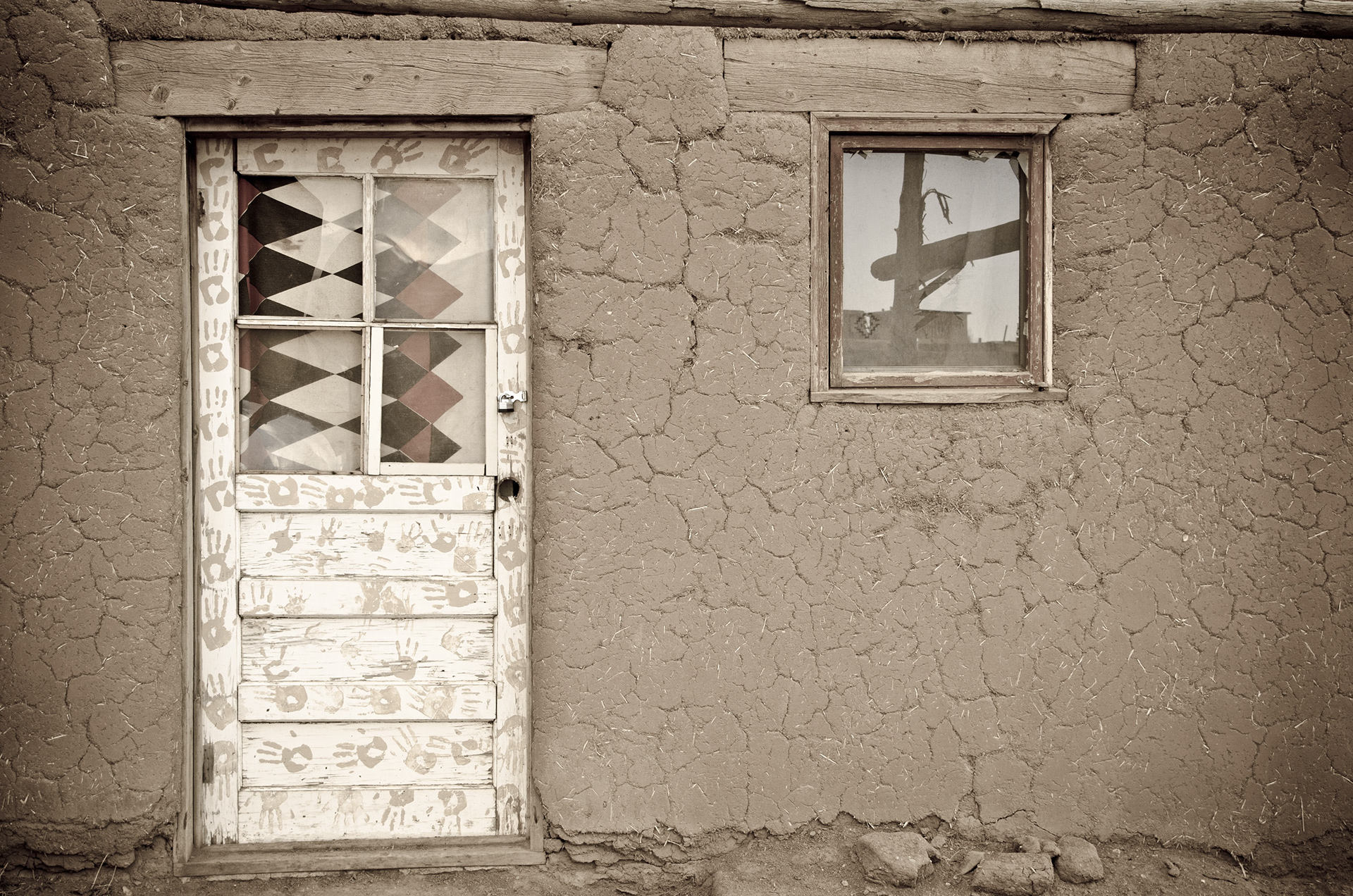 Taos Pueblo - The high desert of Taos, New Mexico, is surrounded by snowcapped mountains dotted with evergreen pines.  When you enter its northern pueblos, you're seeing a cultural landscape that's nearly as unchanged in its thousand year history as the natural one around you. Close to 90 Native Americans occupy the pueblos today, a few of whom are descendants of the original inhabitants. Some have chosen to immerse themselves fully in the traditions of ancestors, while others find a compromise with the modern world as craftsmen, who sell their art, pottery, and foods to tourists. The pueblo is one of only 21 natural and cultural landmarks in the United States recognized as treasures of international heritage by UNESCO.