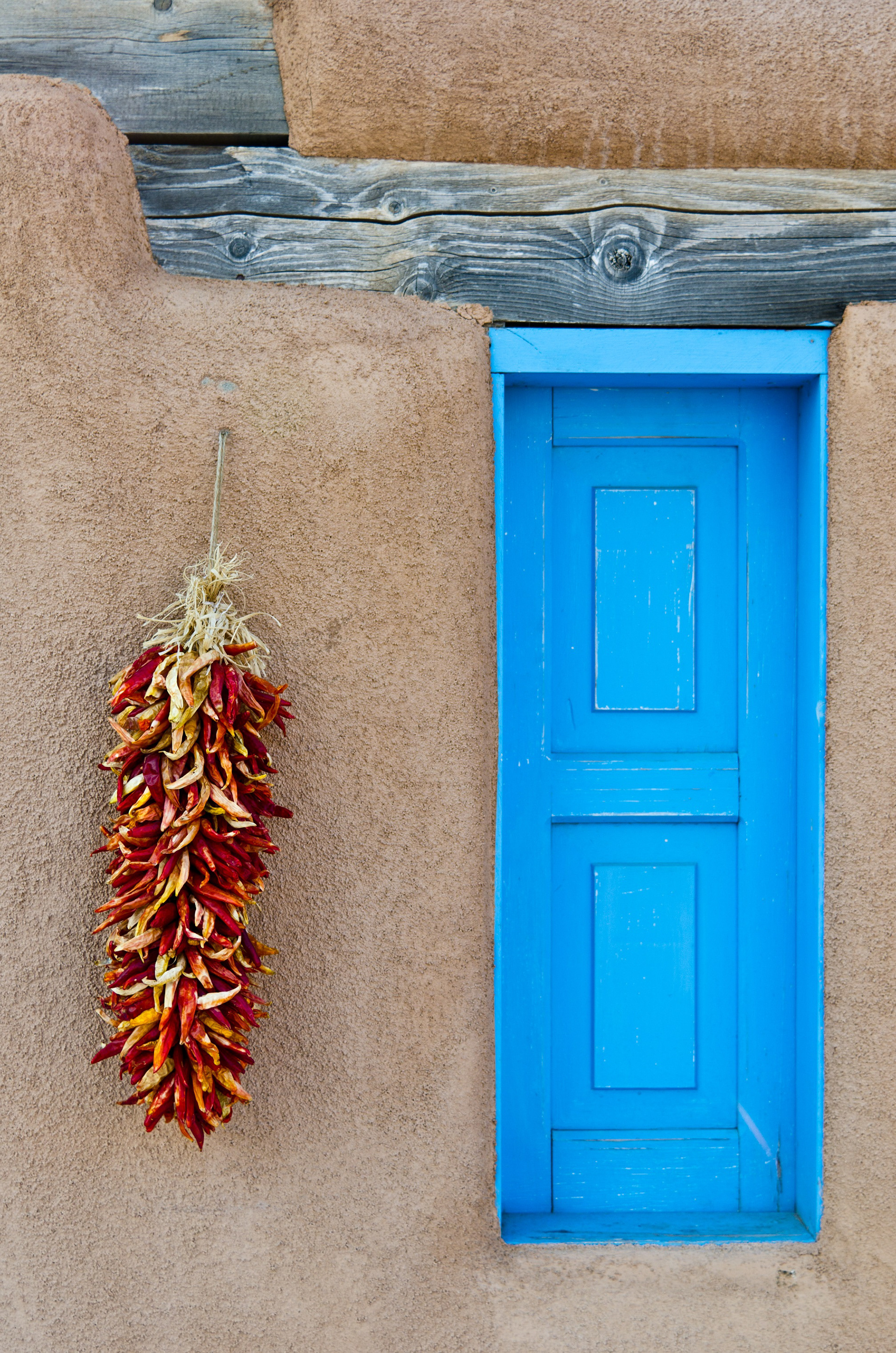 Churchyard Pueblo - A beautiful pueblo-style home adjacent to an old churchyard. Taken in historic Ranchos de Taos, New Mexico.