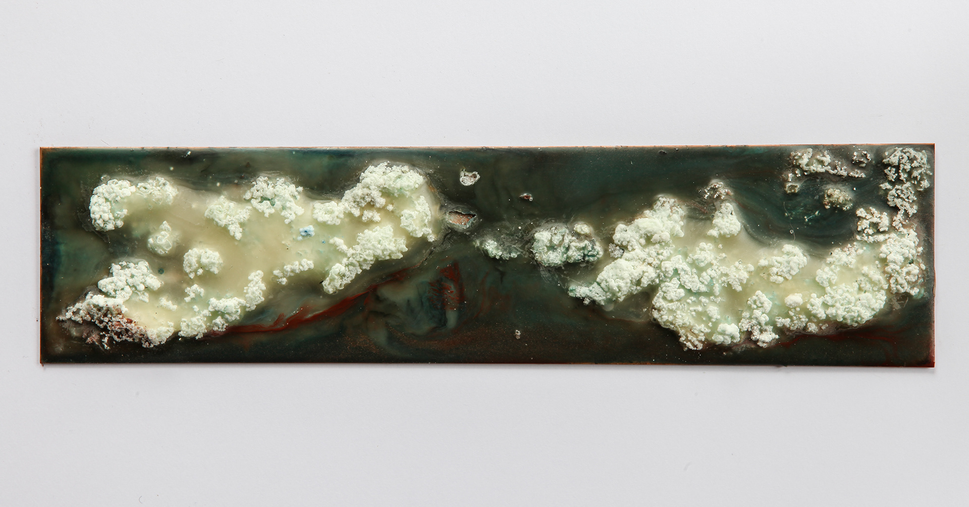 Salt Mists, Heat, fire, beeswax, Dammar, Dead Sea salt, water and pigments on copper 6.3 × 25.5 cm, 2024