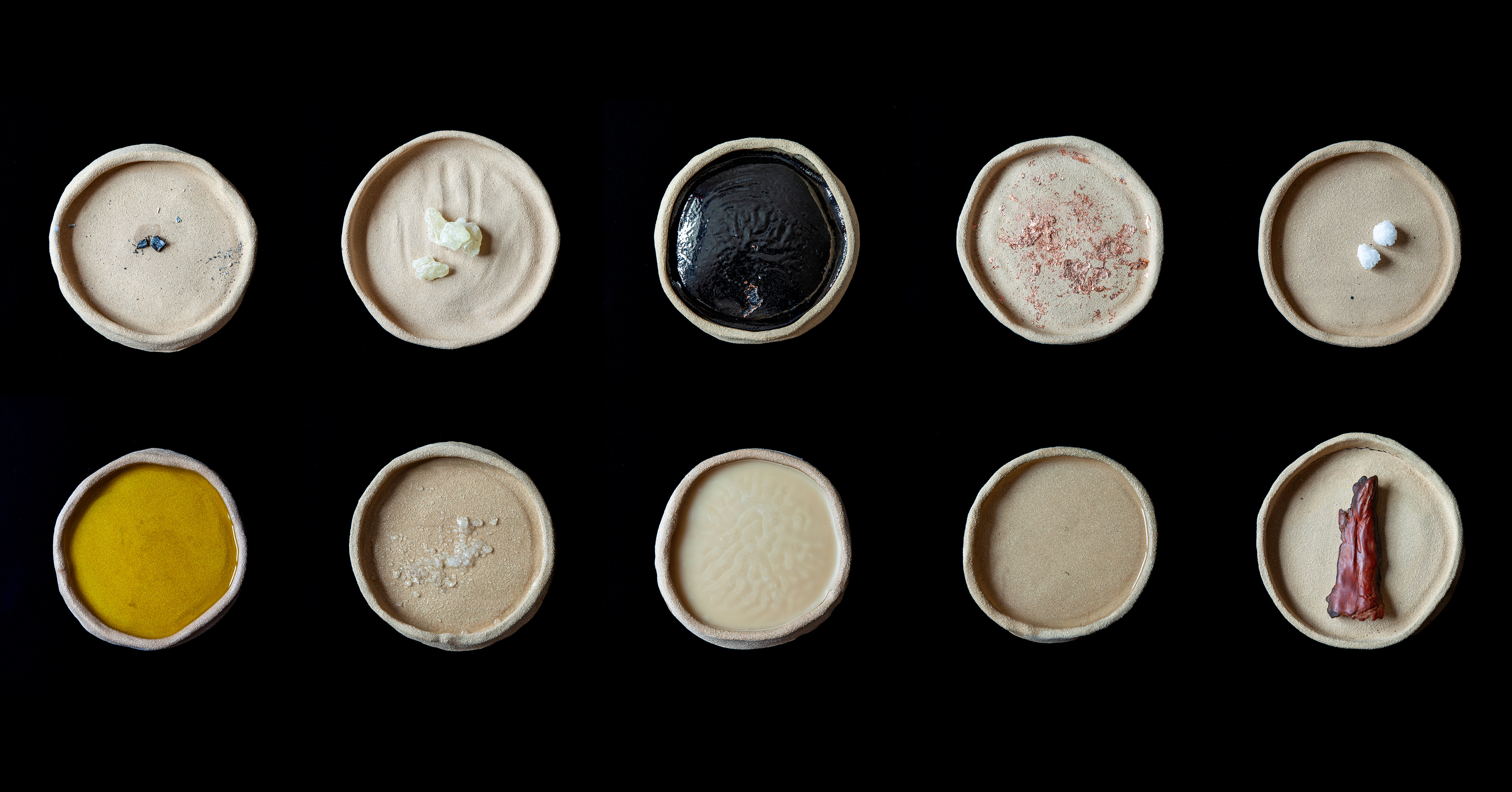 Structure d’évaporation - Materials in circulation, Burnt palo santo, damar, ink, copper leaf, Dead Sea salt, olive oil, Dead Sea water, beeswax, water, two-finger beeswax amulet, 2024-2026