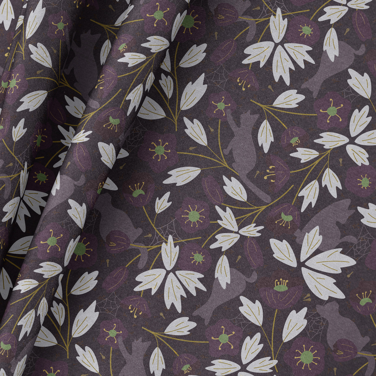 Hellebore and cats pattern in plum noir gold colorway shown on close-up fabric by Mabel Chow, licensable surface design