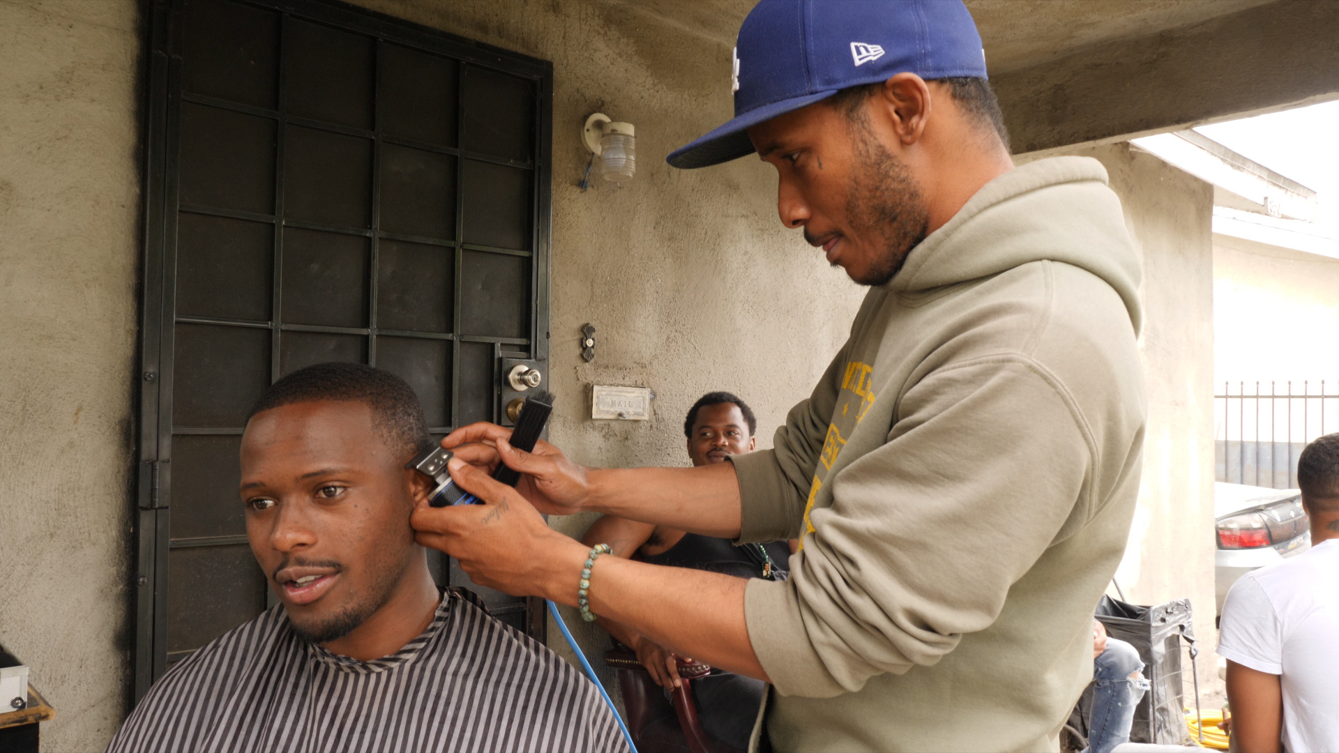 LeQuan Muhammad gets a hair cut.
