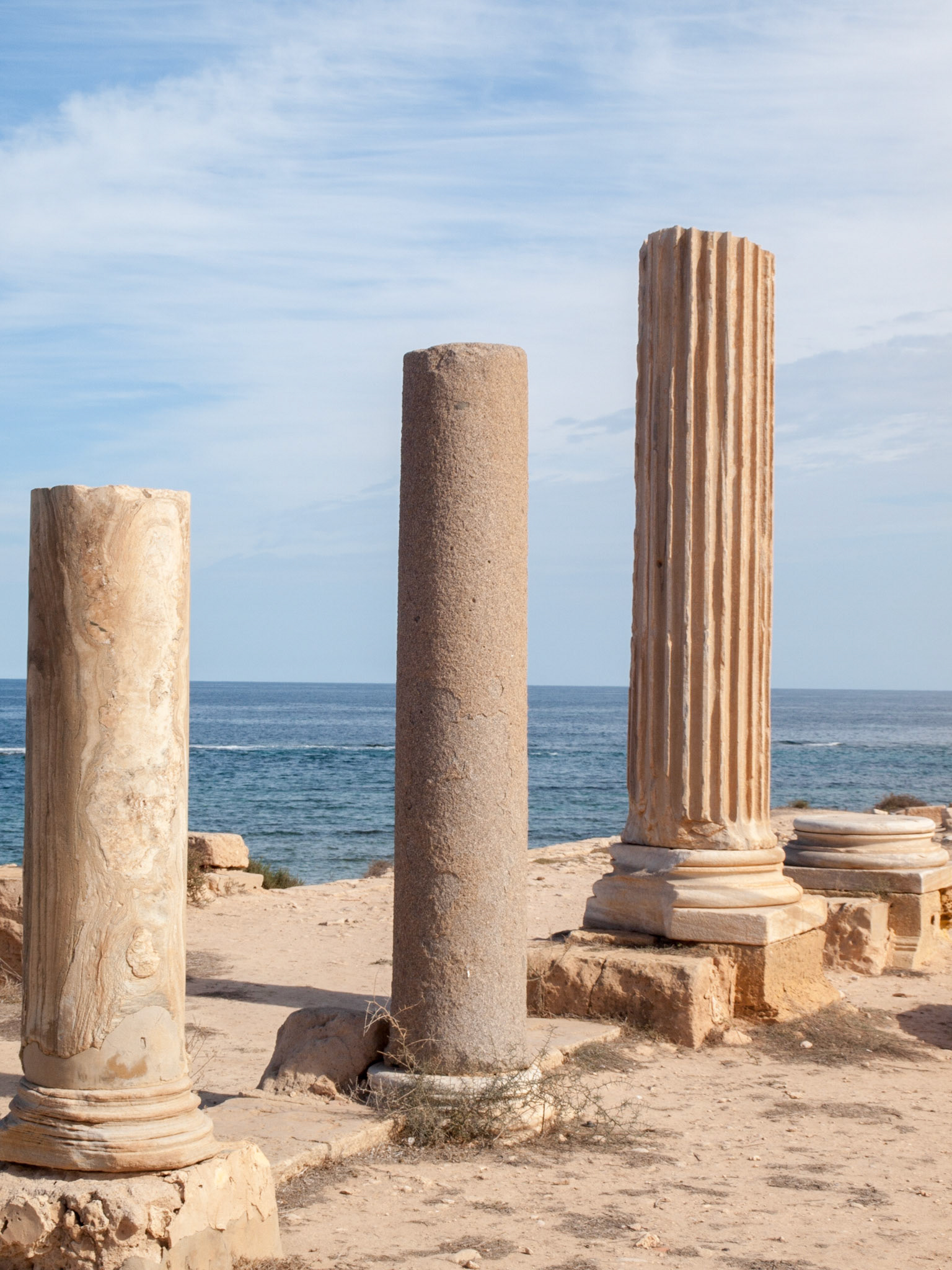 Roman ruins of different columns of Sabratha by the sea