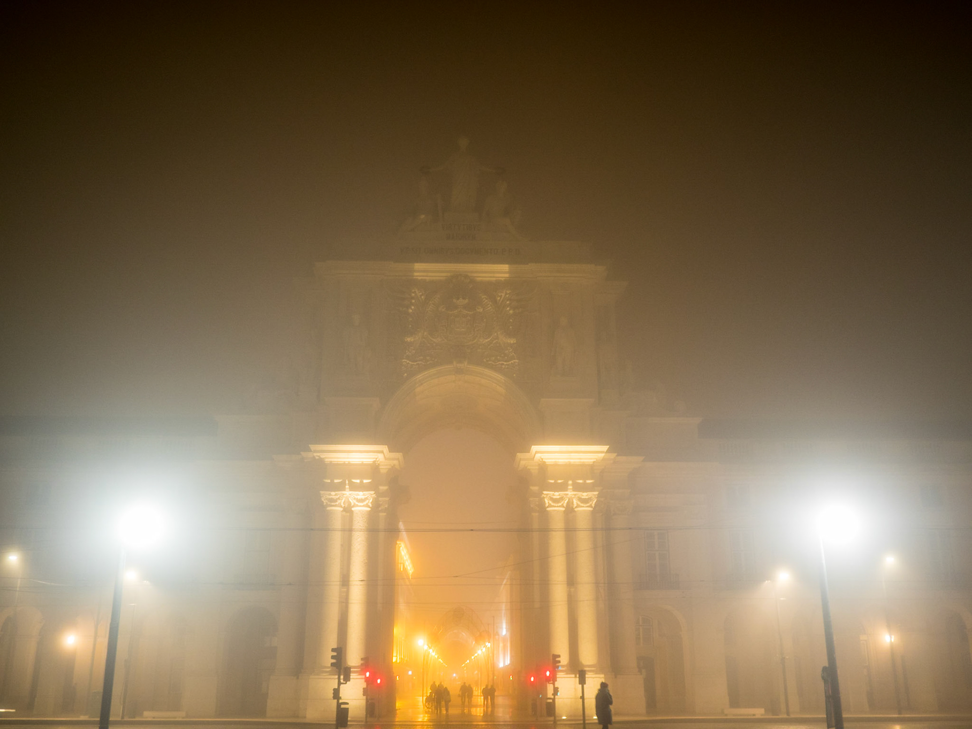 The Arch of Augusta street hiddes behinde the fog at night