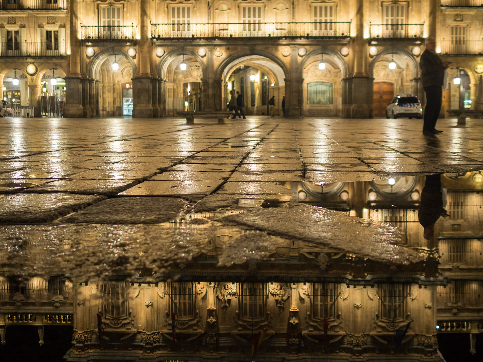 Salamanca Plaza Mayor reflectad on the wet stones