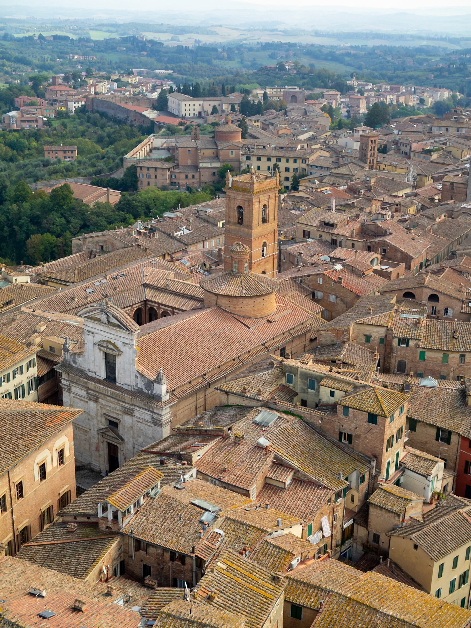 Siena roofs and the countryside from the top of Torre del Mangia