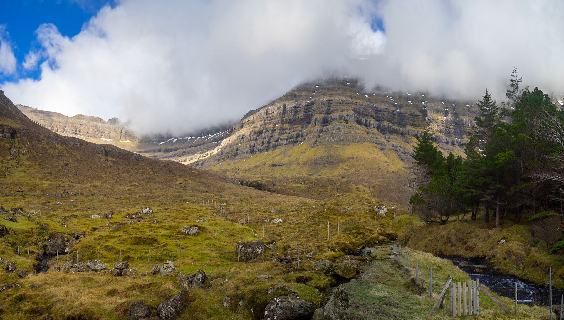 Kunoy park below Urðafjall mountain