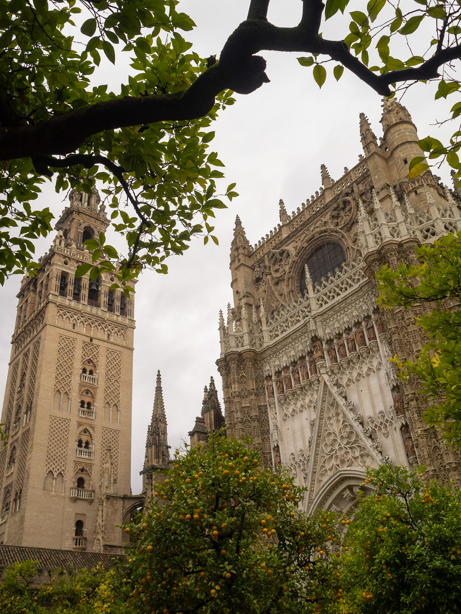 Door of the Conception and Giralda tower, Seville Cathedral
