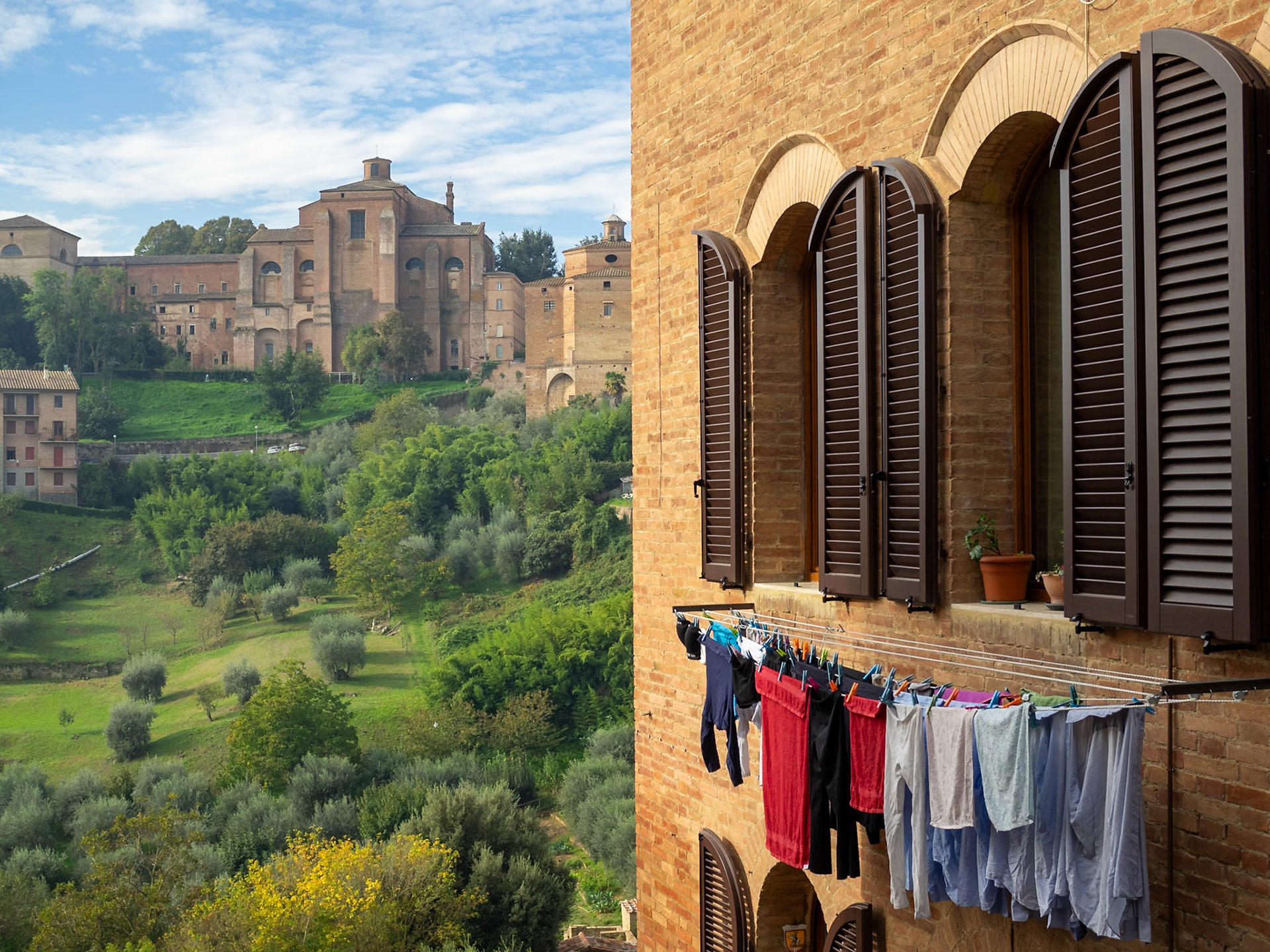 Siena cityscape behind a window