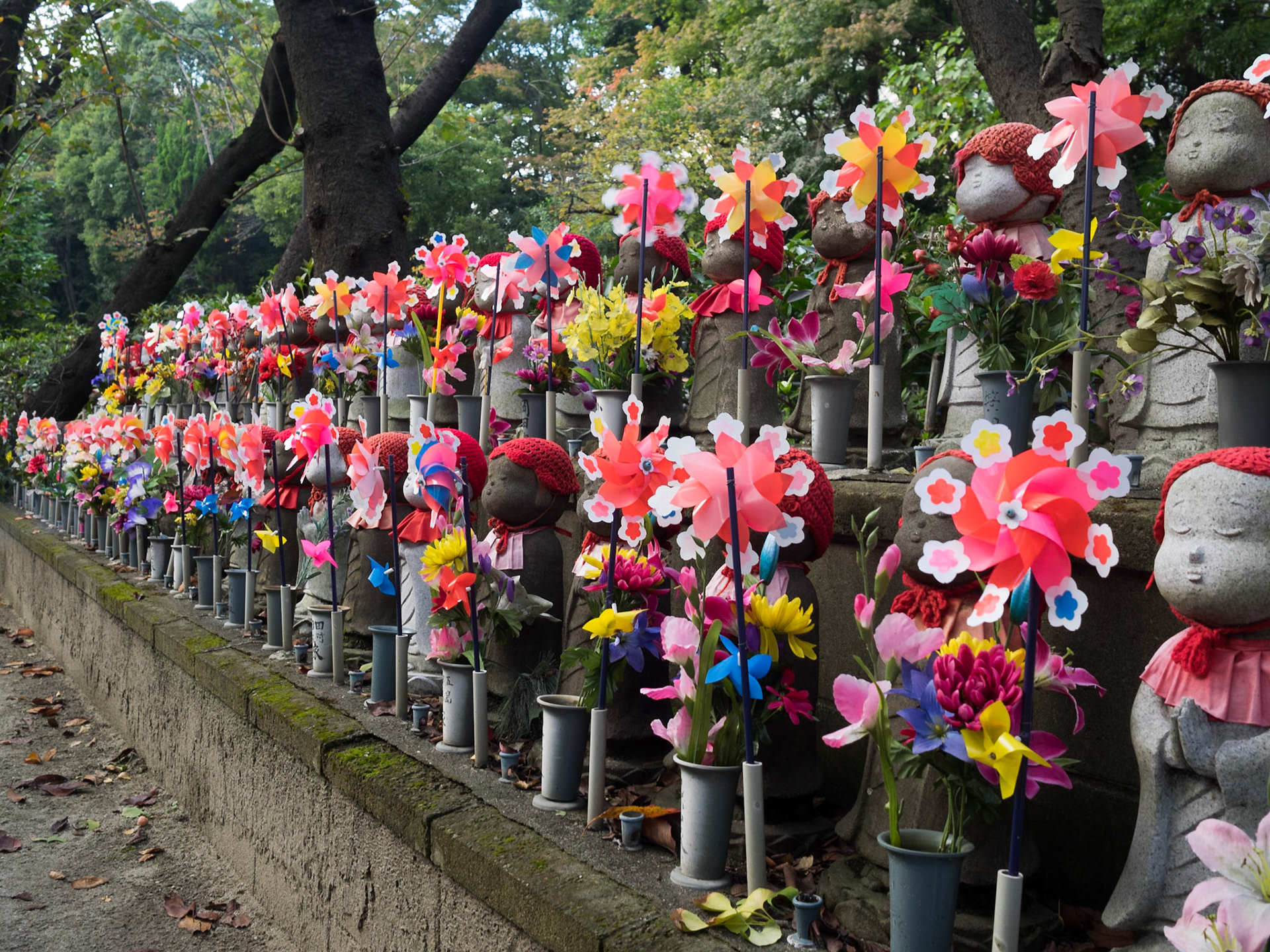 Zojo-jo stone dolls dressed in memory of deceased children