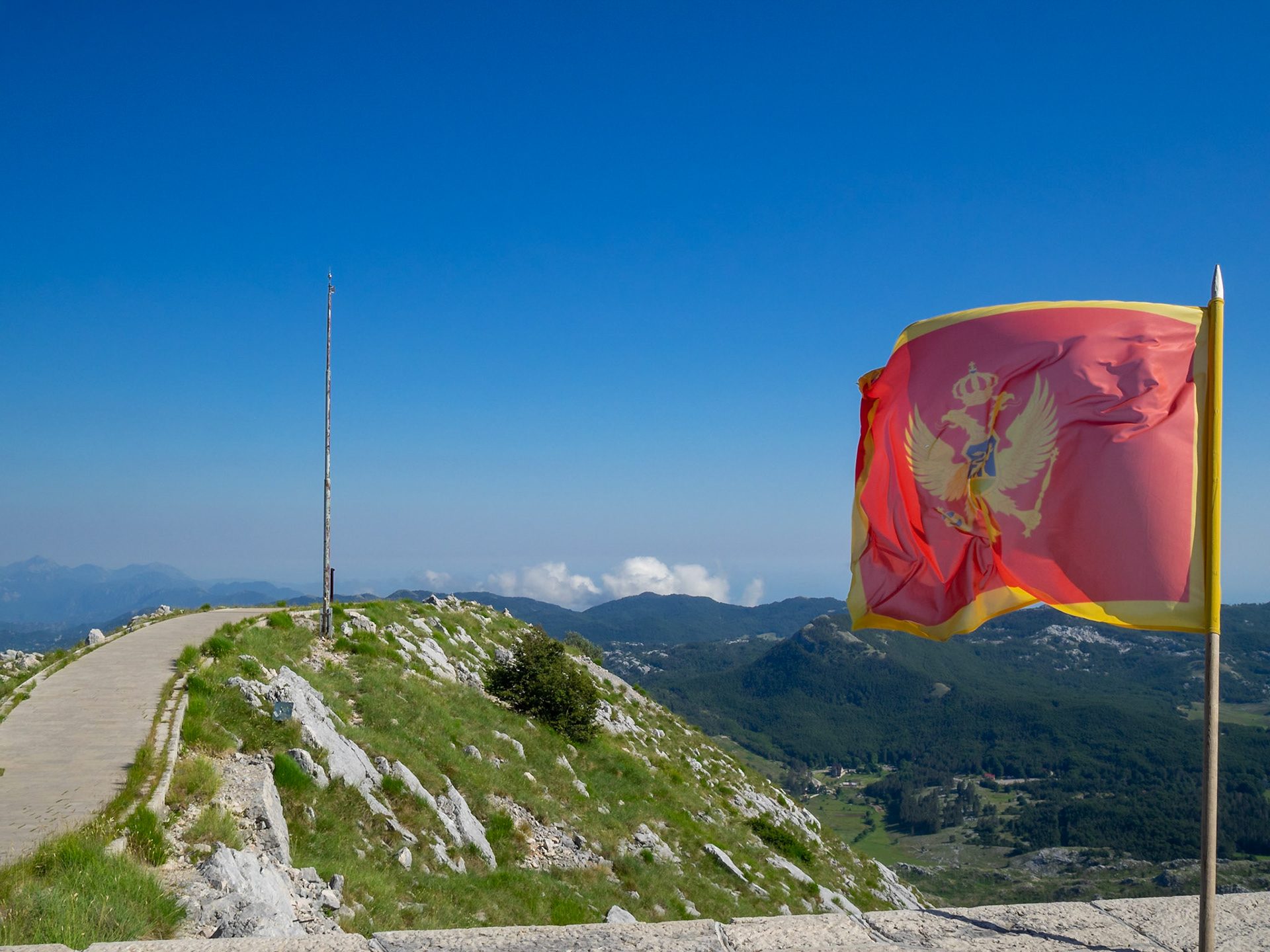 Montenegrin flag waving at the Mausoleum of Petar II Petrovic Njegos