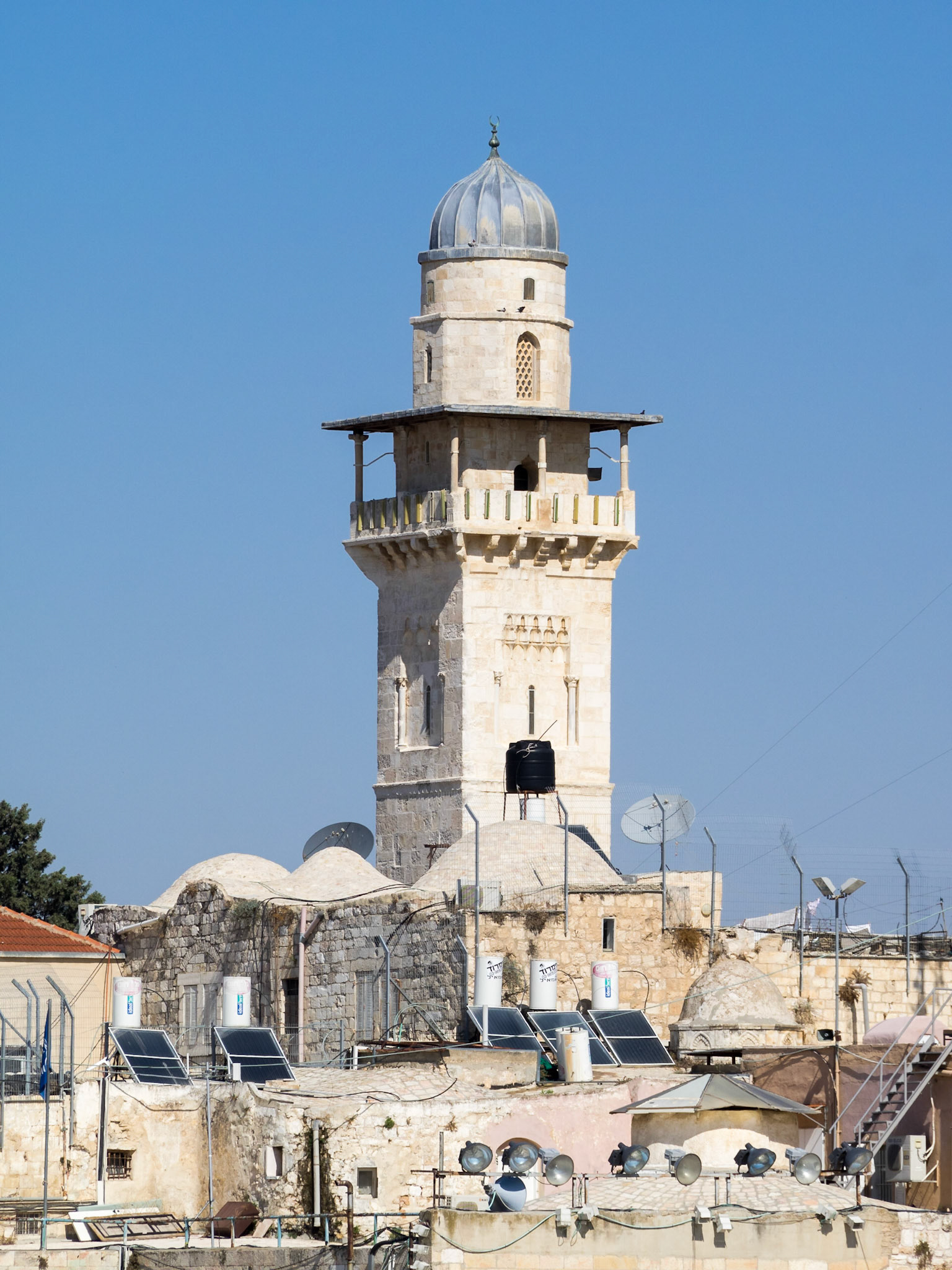 Mosque minaret over the roofs of Old Jerusalem Muslim Quarter