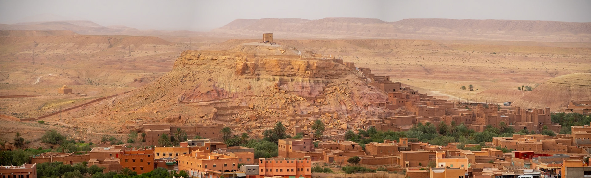Ait-Ben-Haddou granary and qsar adobe buildings above the modern village, Morocco