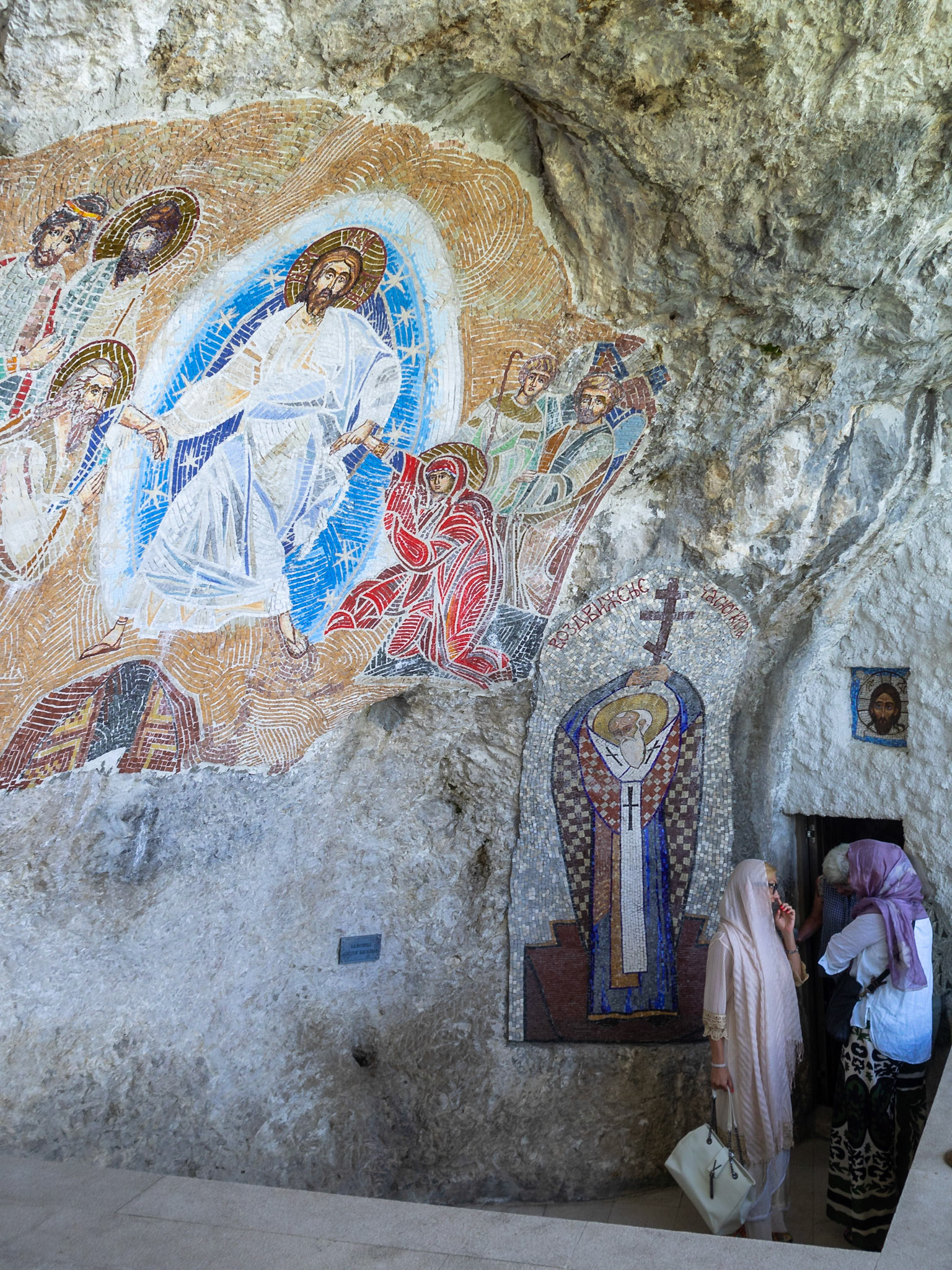 Pilgrims at the Ostrog Monastery upper church