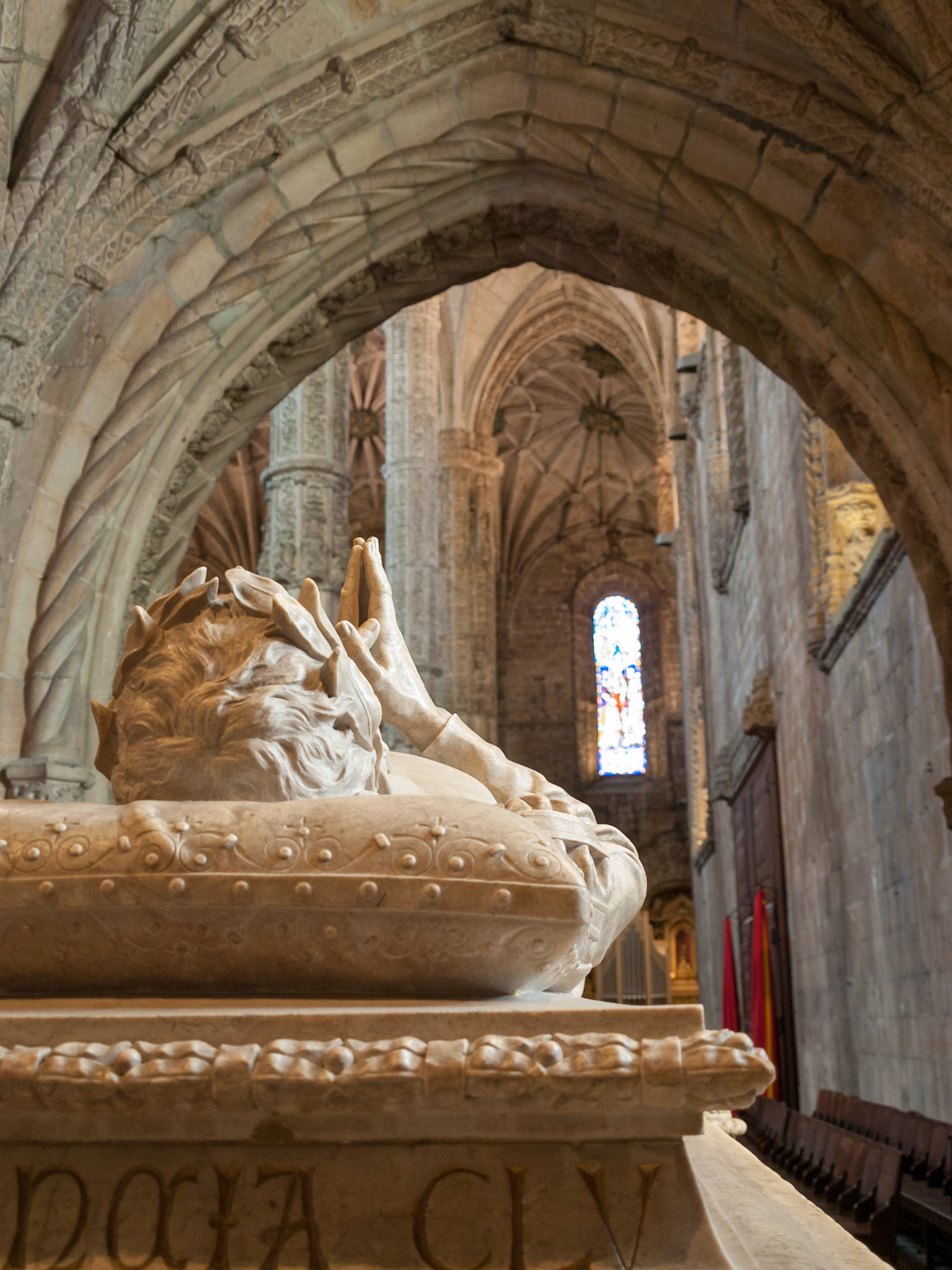 King tomb sculpture detail inside Jeronimos Monastery in Belem, Lisbon