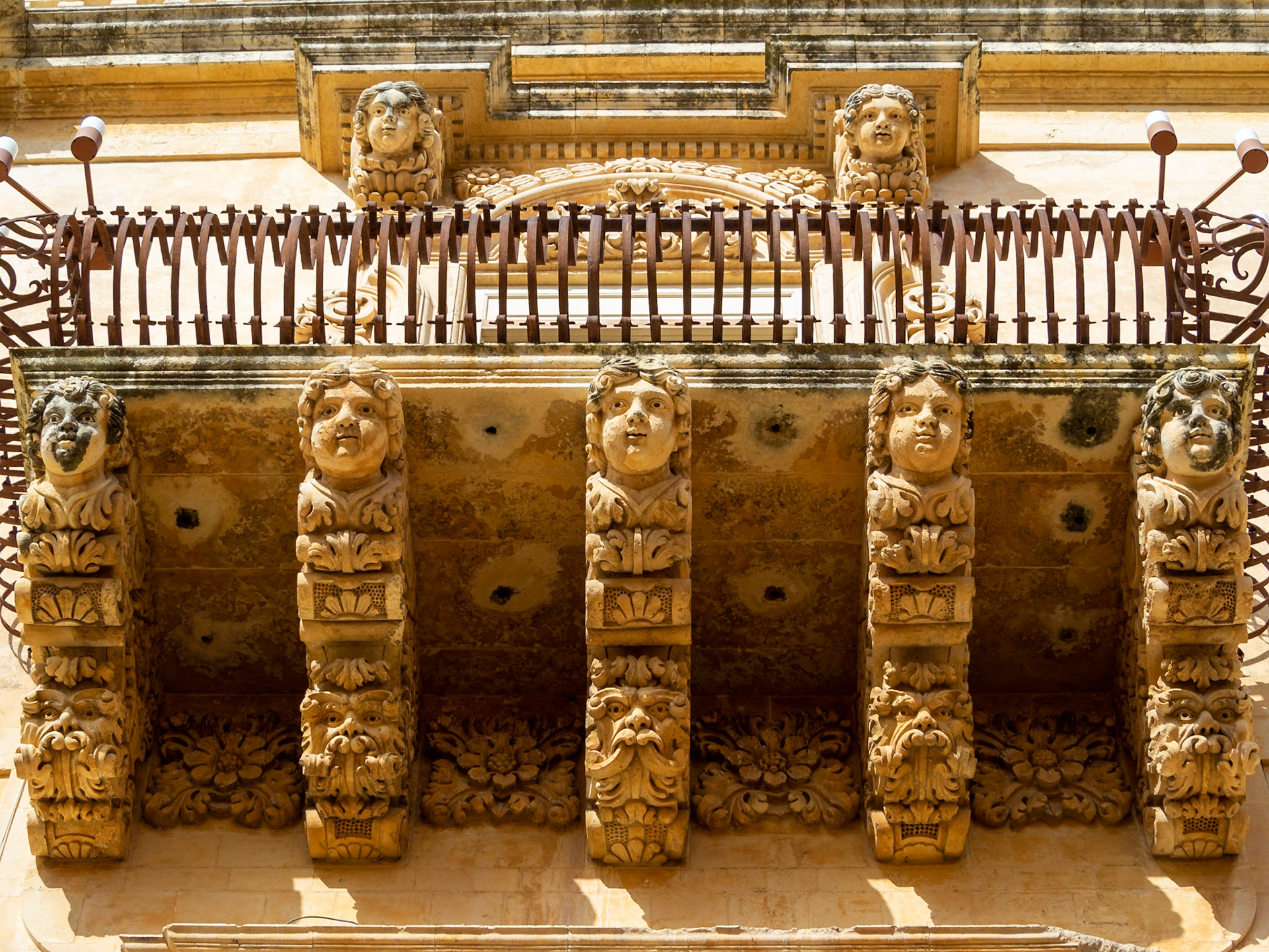 Baroque Palazzo Nicolaci stone carved balcony, Noto