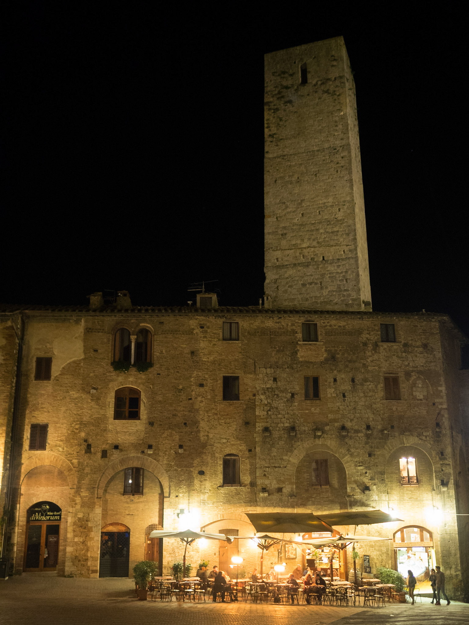 At night in San Gimignano streets under the towers