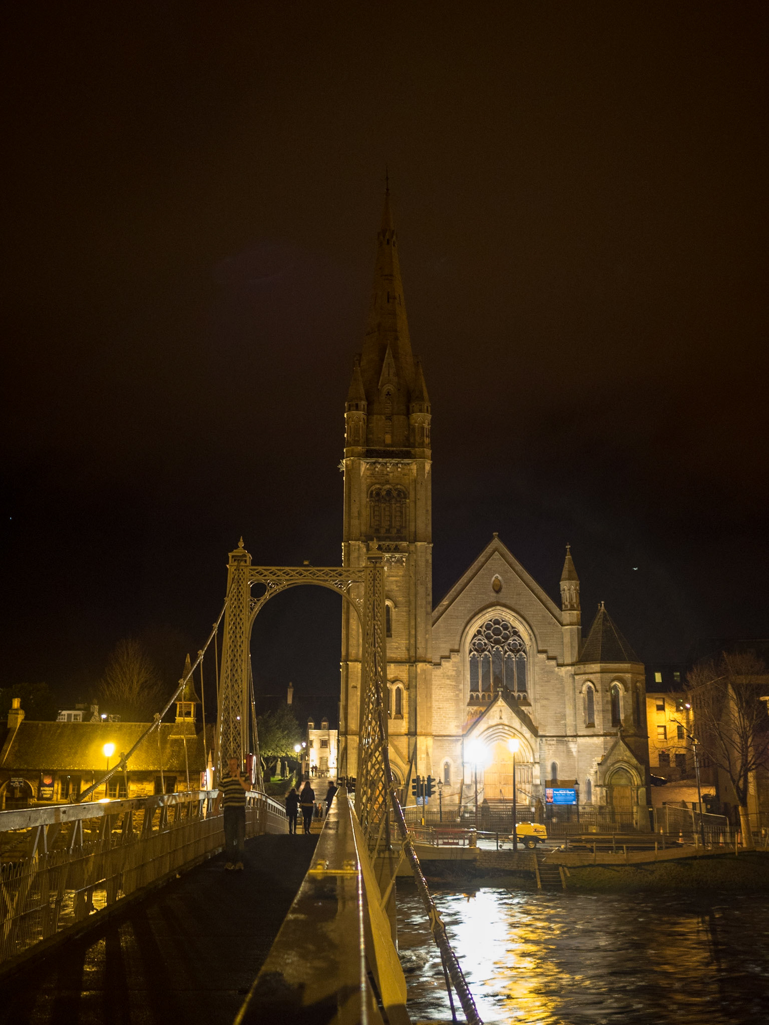 Greig Street bridge at night with church in background