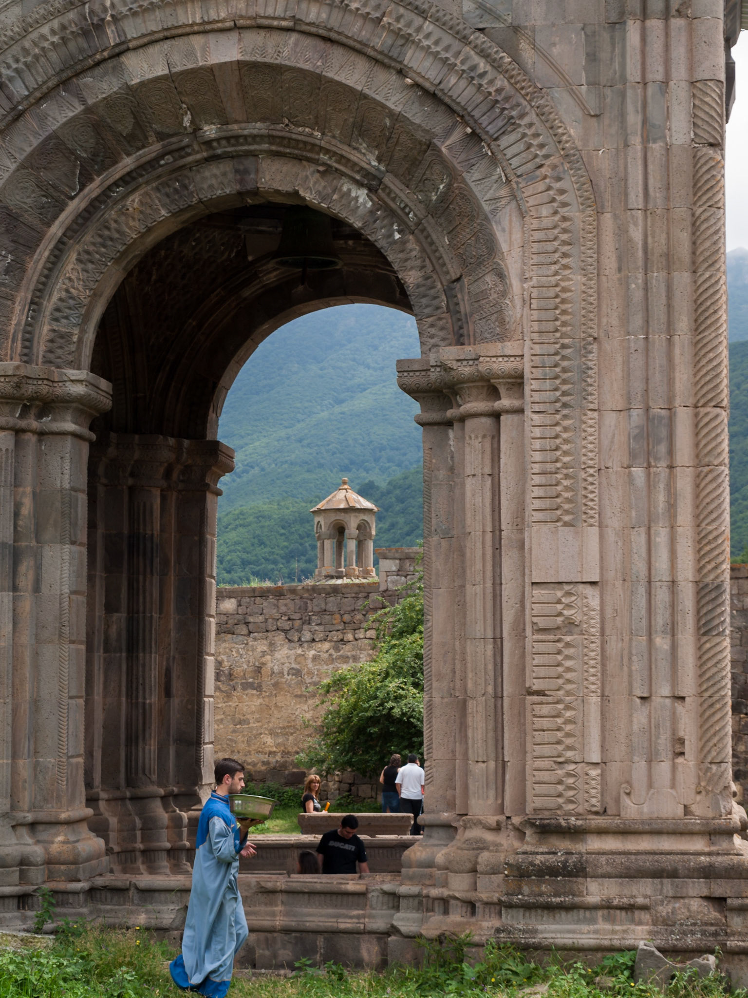 Tatev Monastery, monk near Surp Poghos-Petros church entrance