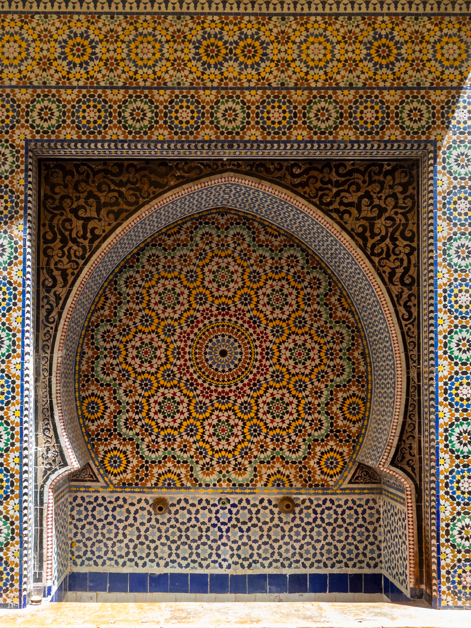 Mesbahiyya Madrasa zellij covered fountain, Fez, Morocco