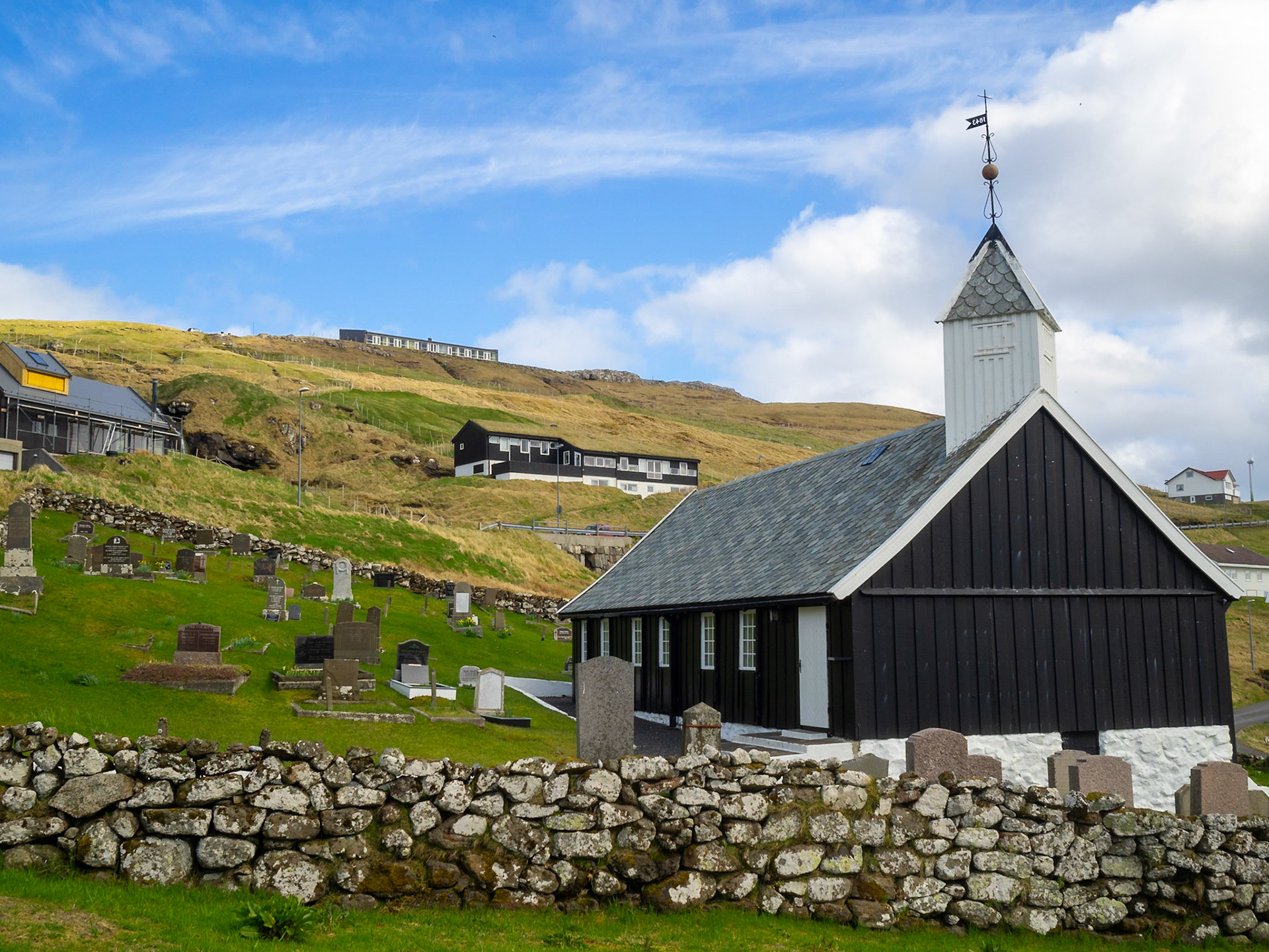 Nes church constrcuted with black-tarred timber and a slate roof