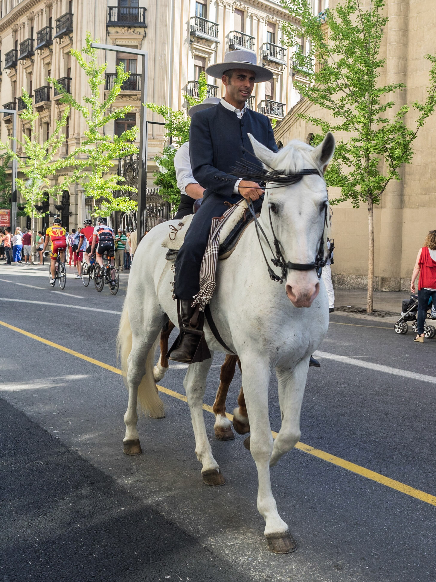 Street parade during the Las Cruces de Mayo in Granada
