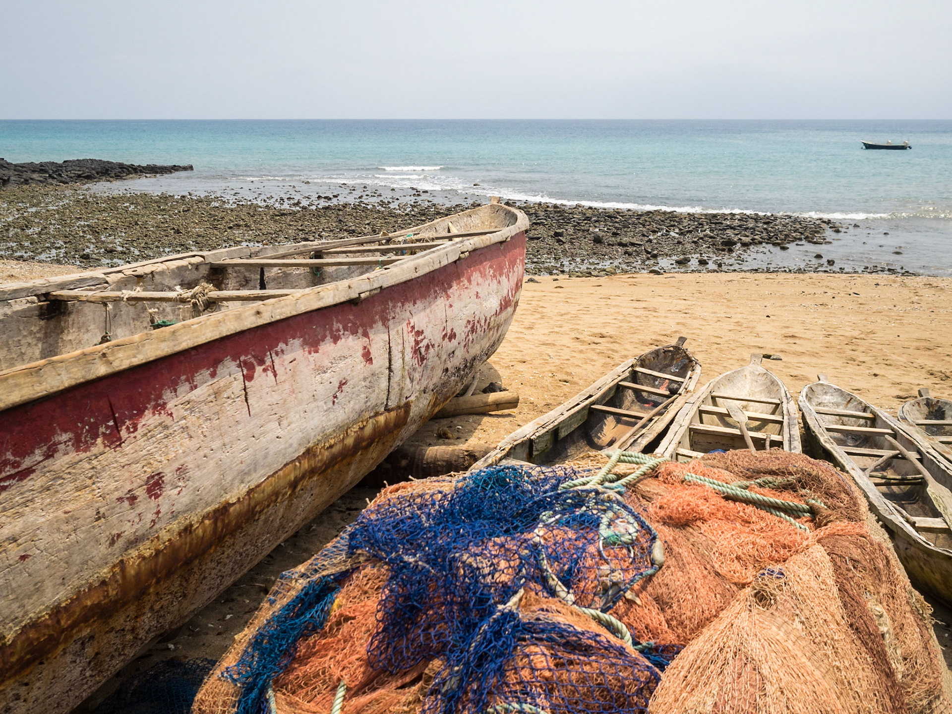 Fishing canoes at the beach in Morro Peixe, São Tomé