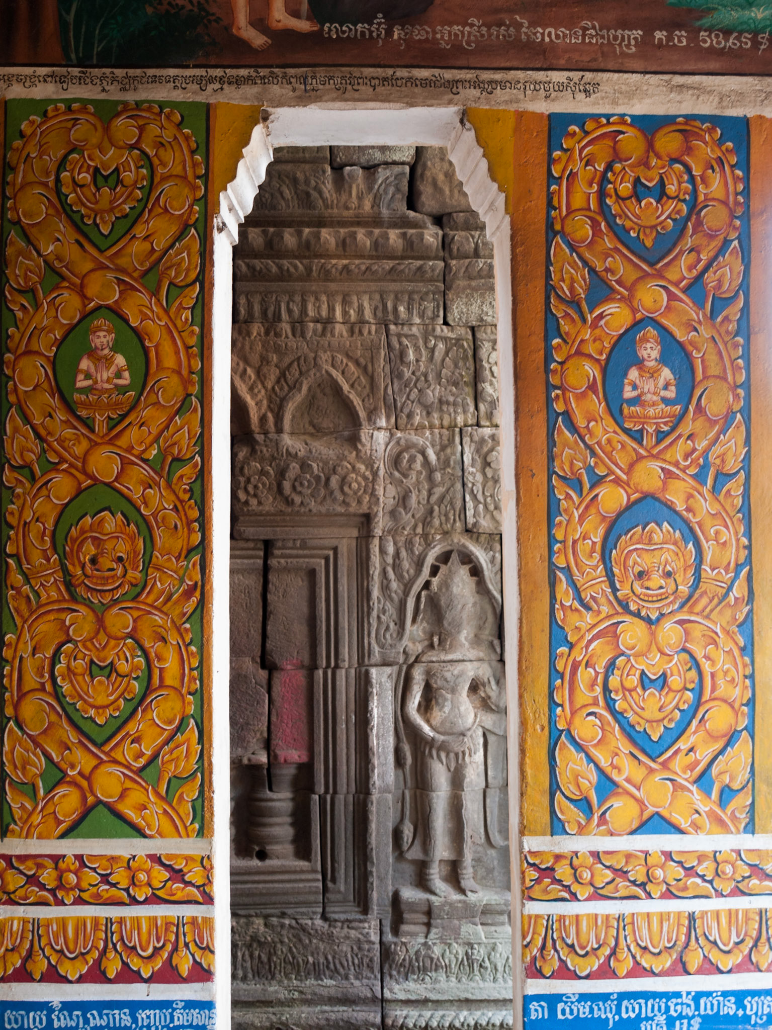 Wat Nokor, Khompong Cham, Cambodia - an 11th century Mahayana Buddhist shrine with a modern Theravada Buddhist pagoda inside