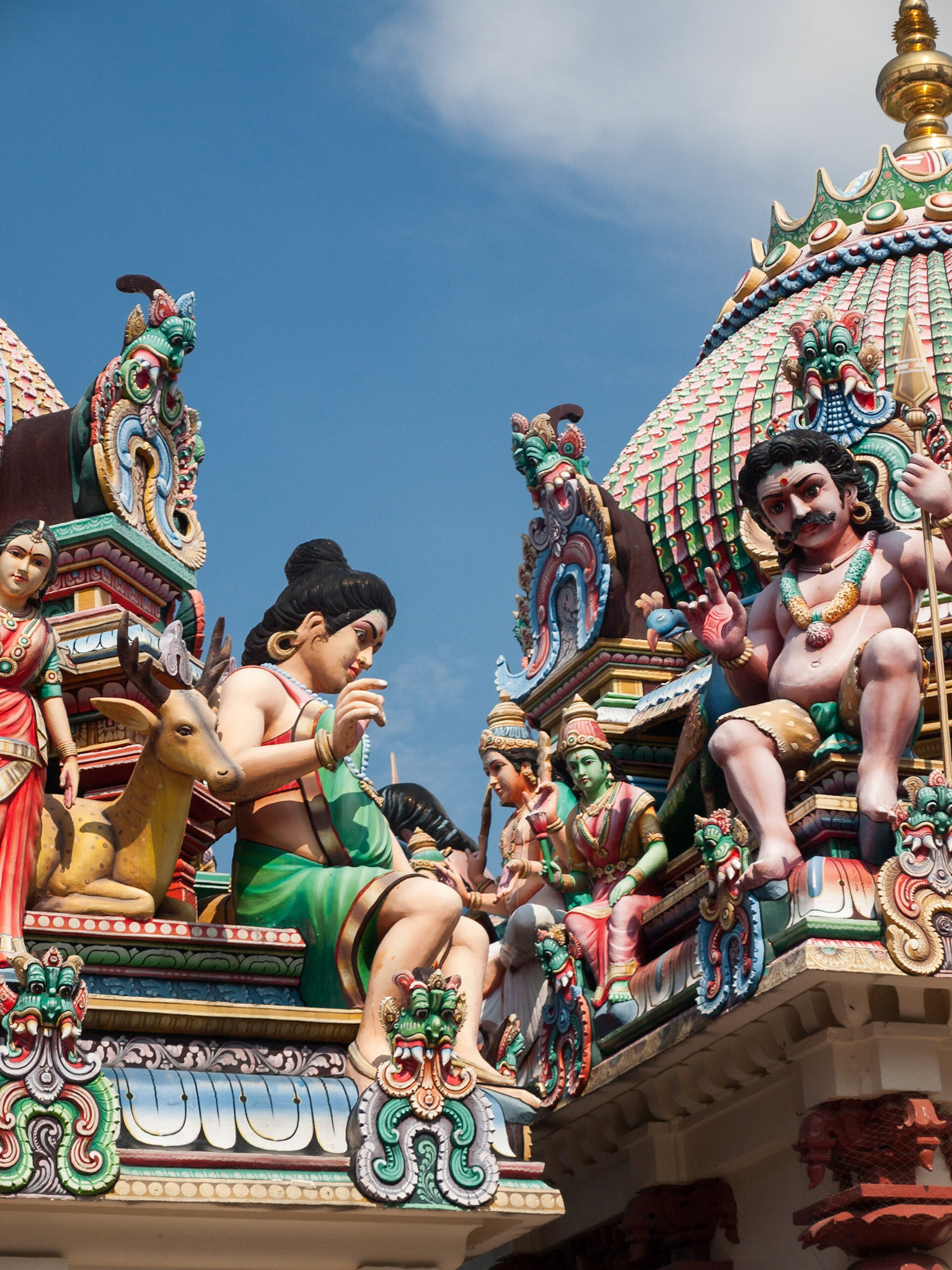 Colorful god's sculpture in Sri Mariamman Temple