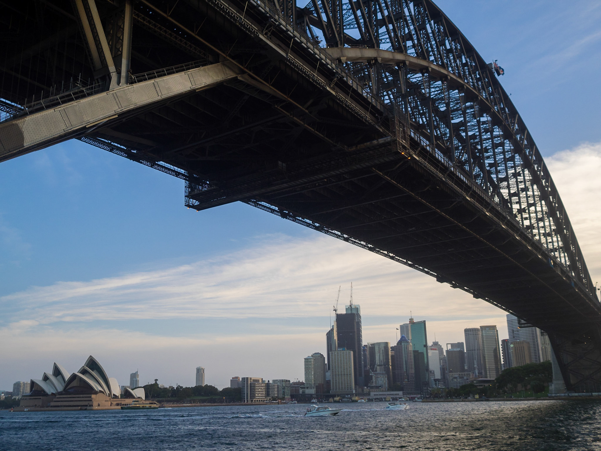 Sydney Harbour Bridge and the cityscape below seen from Milsons Point