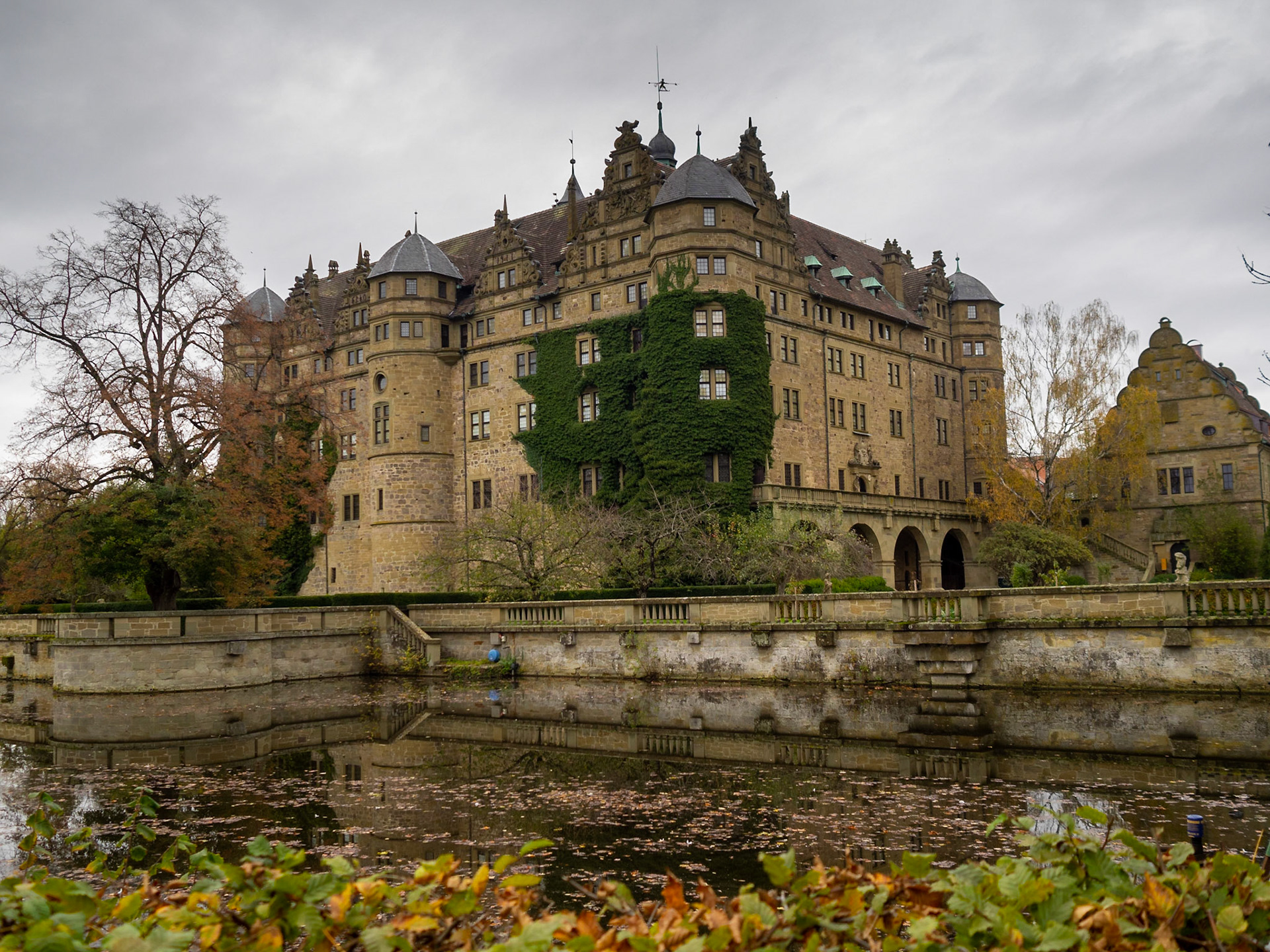 Neuenstein Schloss reflected in the moat