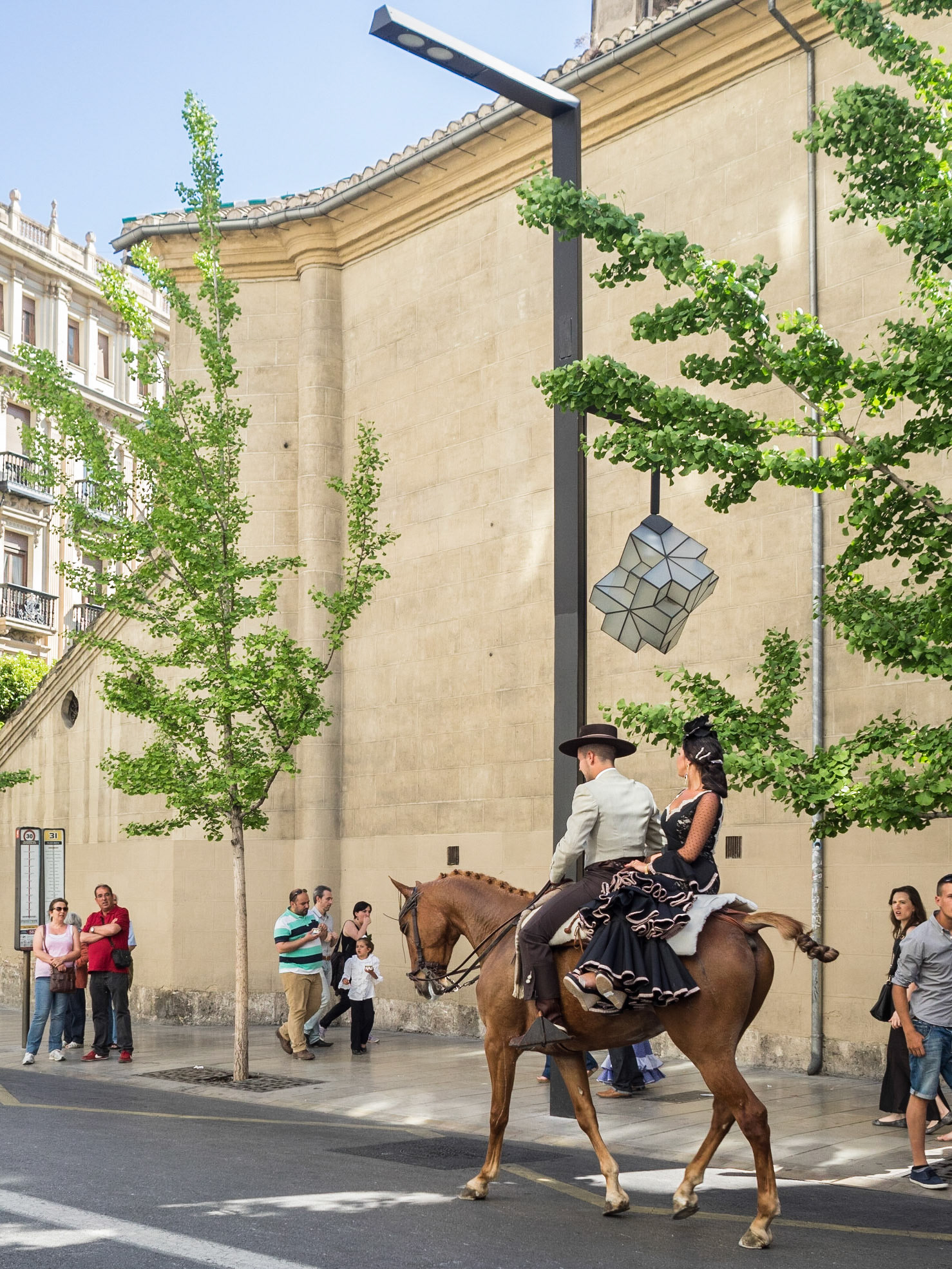Street parade during the Las Cruces de Mayo in Granada