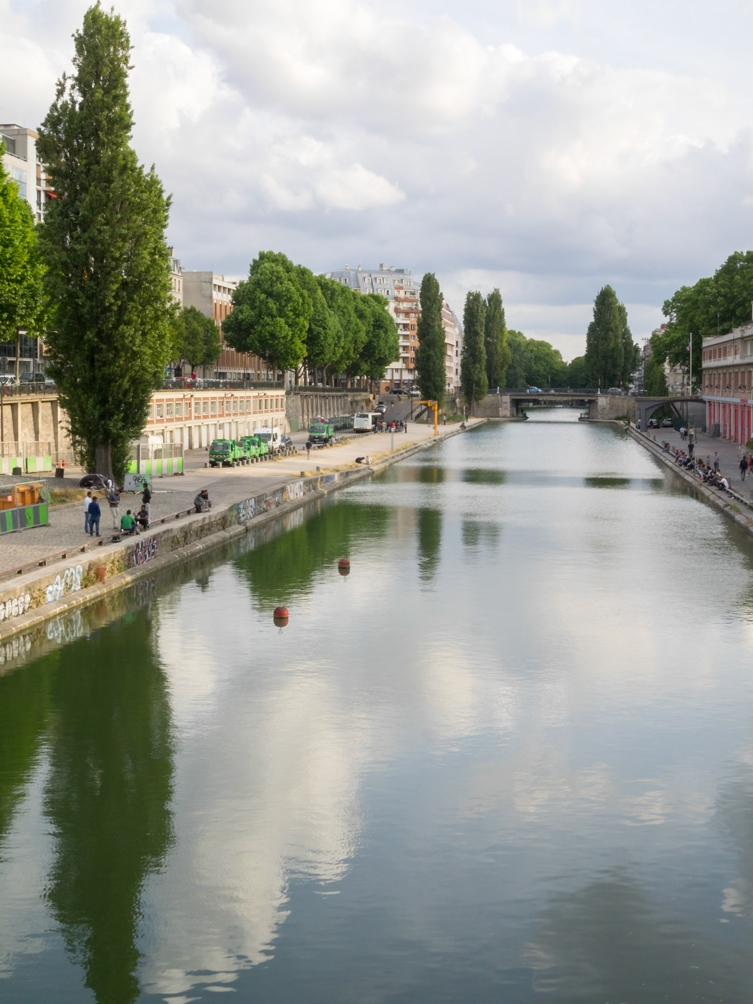 General view of Canal Saint-Martin with the sky reflected in the water