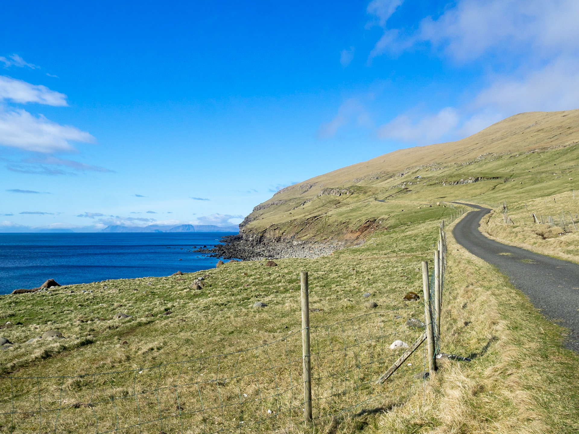 Road along Sandoy island coastline