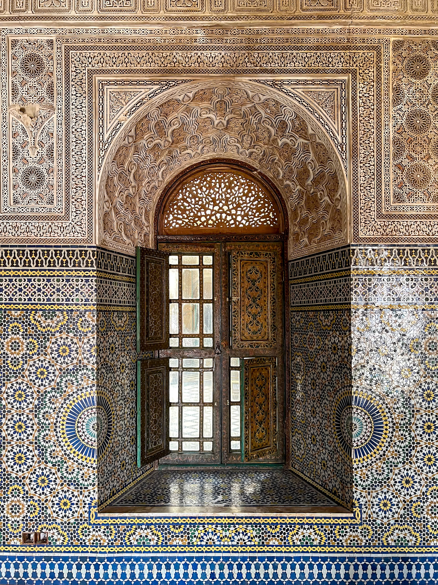 Telouet Kasbah room window framed by zellij mosaic, Morcocco